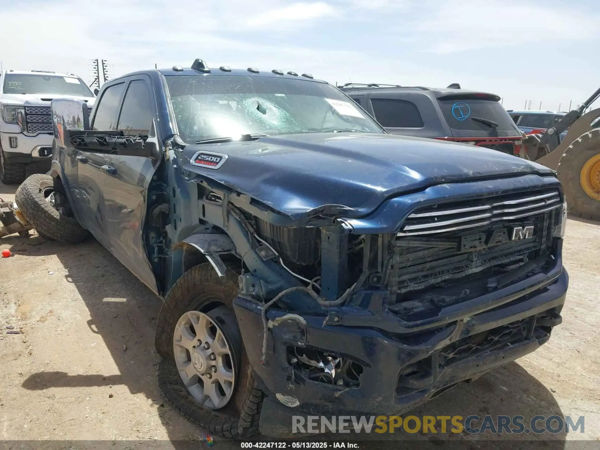1 Photograph of a damaged car 3C6UR5FL1NG372673 RAM 2500 2022