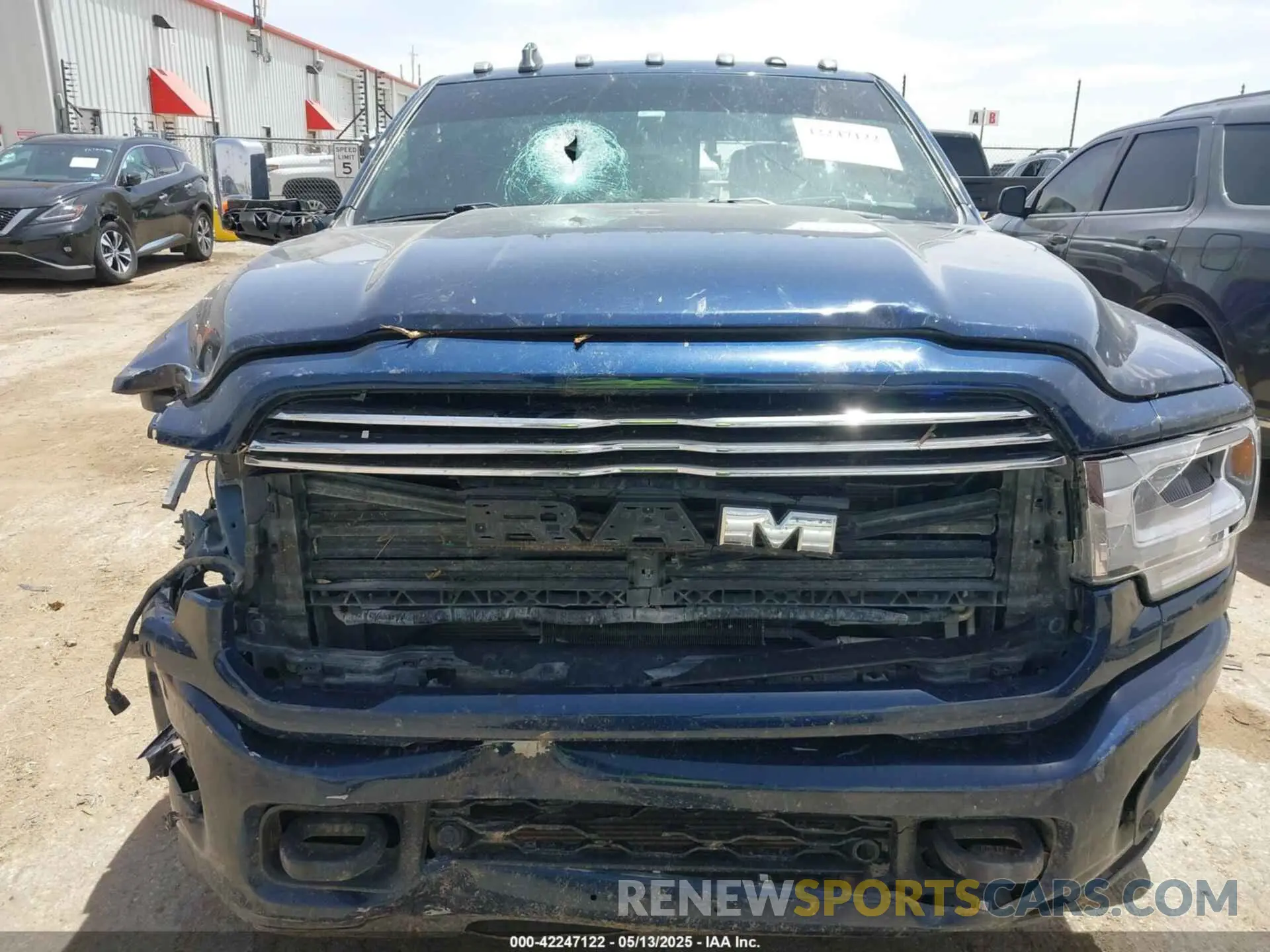13 Photograph of a damaged car 3C6UR5FL1NG372673 RAM 2500 2022