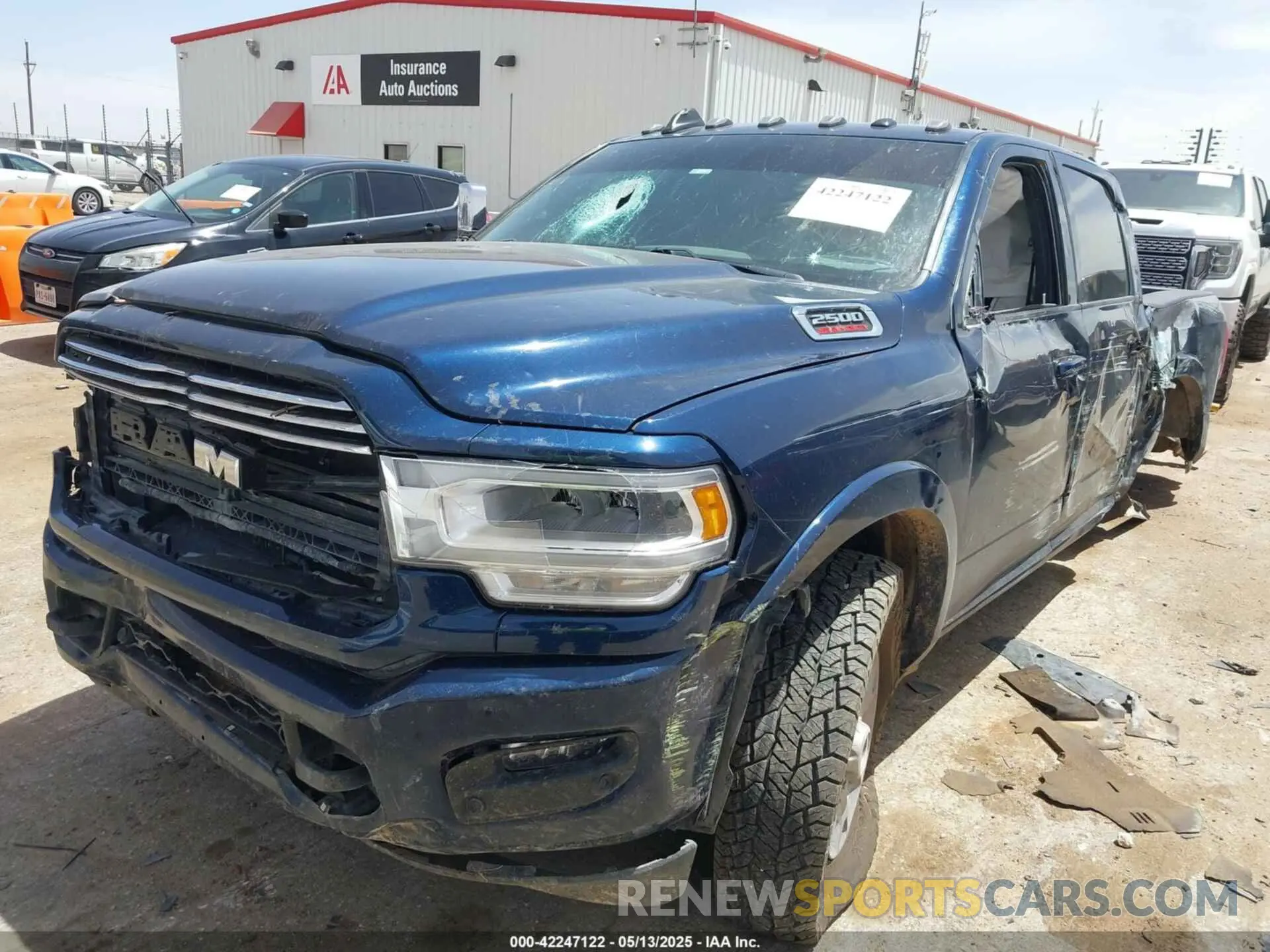 2 Photograph of a damaged car 3C6UR5FL1NG372673 RAM 2500 2022