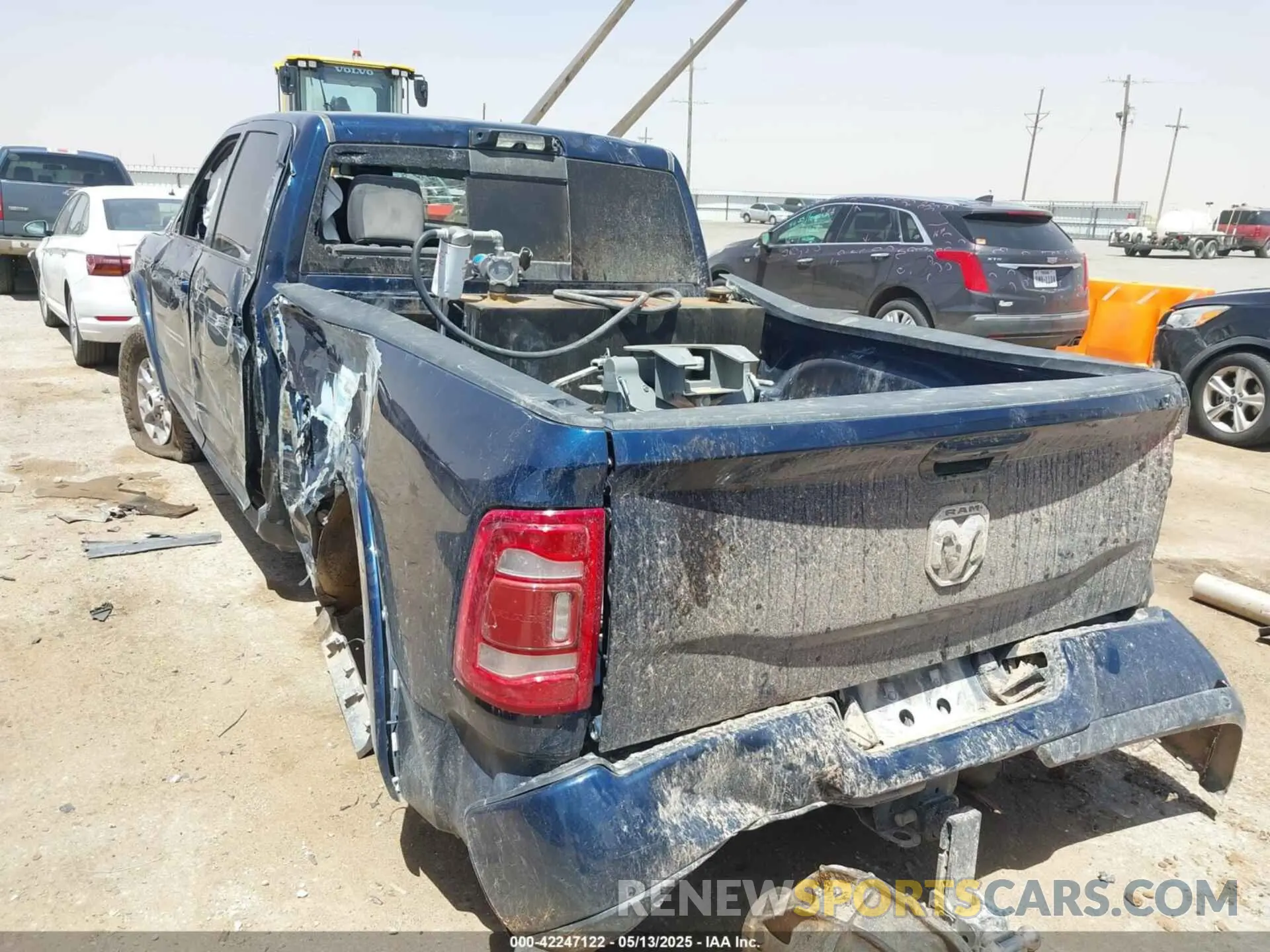 3 Photograph of a damaged car 3C6UR5FL1NG372673 RAM 2500 2022