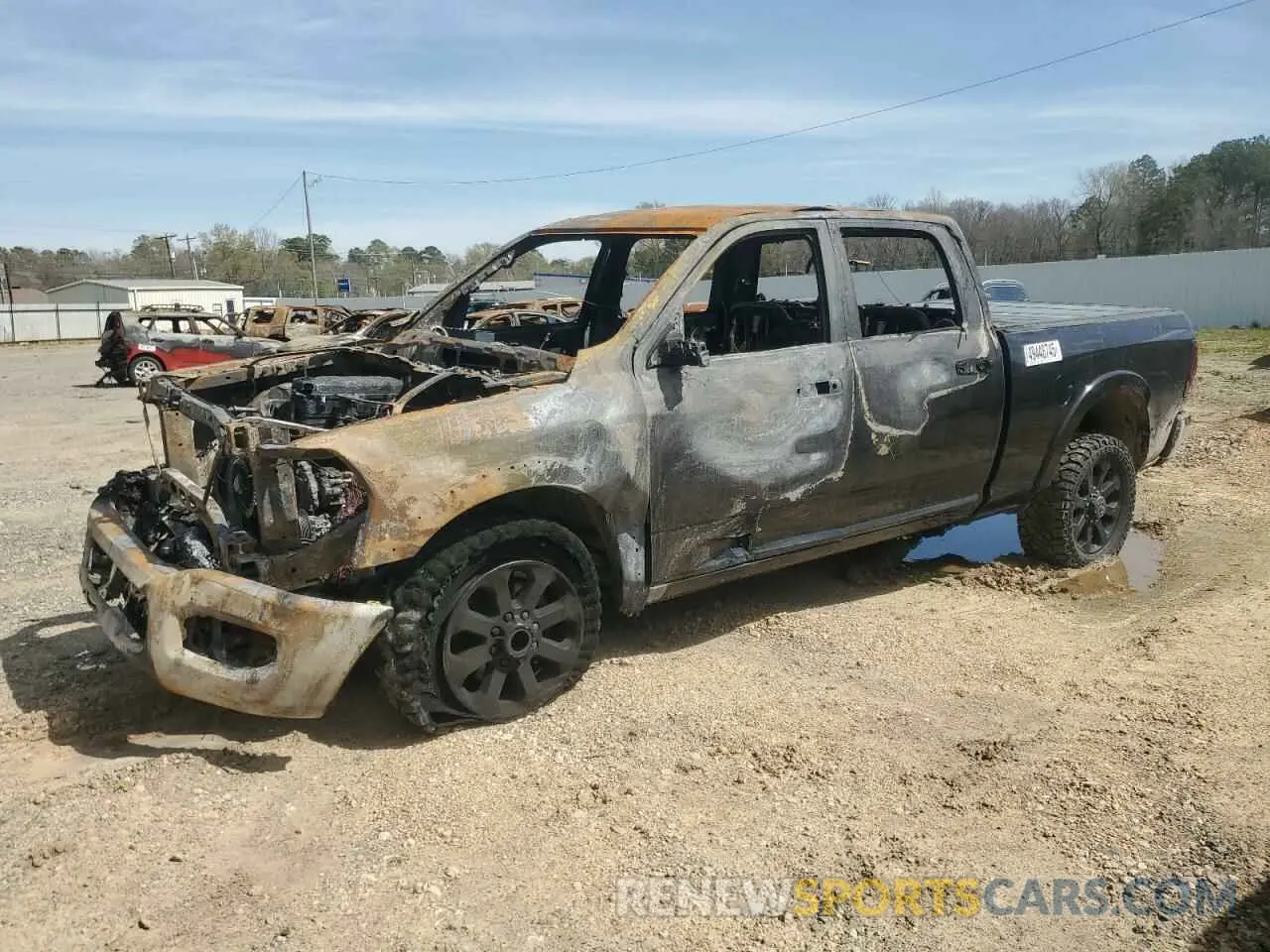 1 Photograph of a damaged car 3C6UR5FL2NG111813 RAM 2500 2022