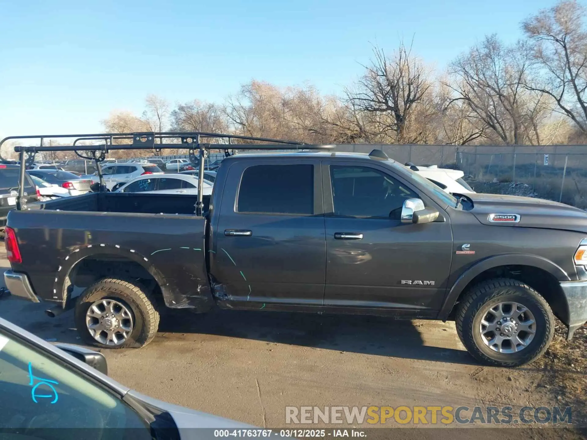 14 Photograph of a damaged car 3C6UR5FL5NG203501 RAM 2500 2022