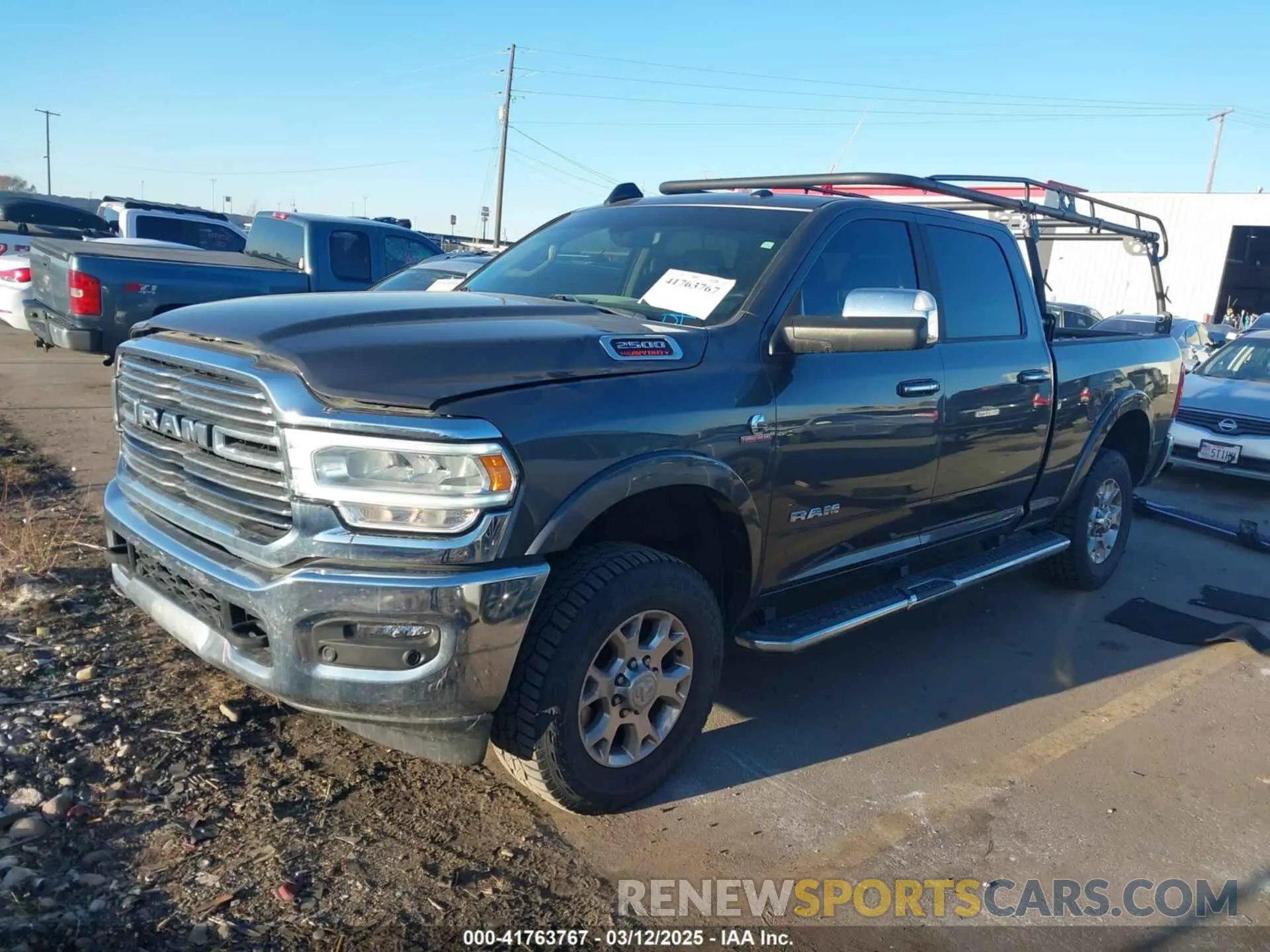 2 Photograph of a damaged car 3C6UR5FL5NG203501 RAM 2500 2022
