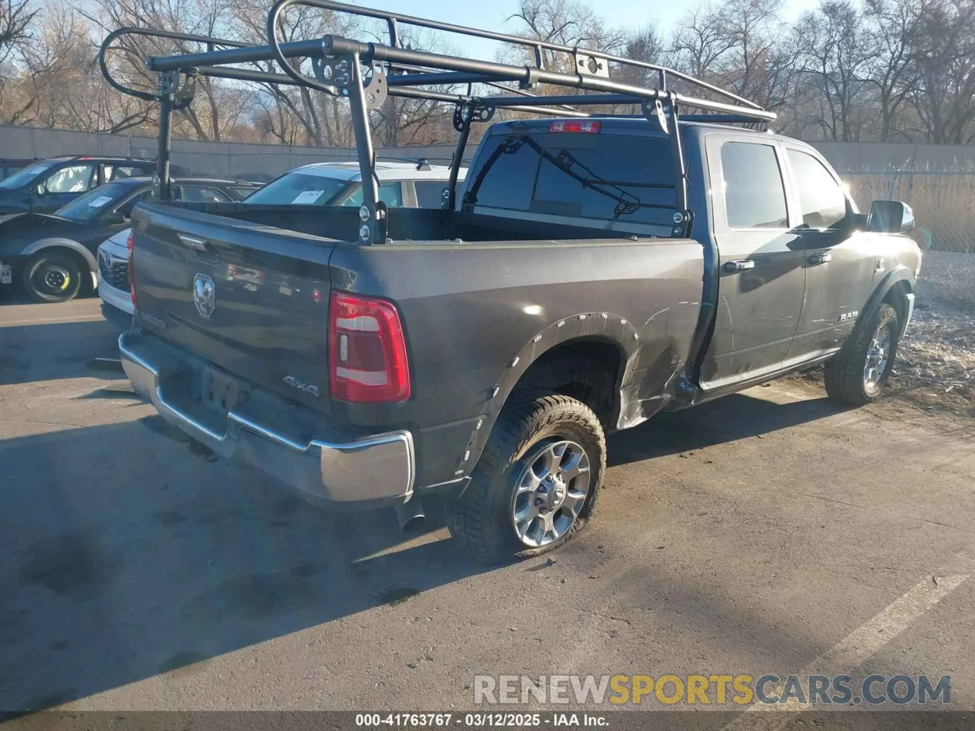4 Photograph of a damaged car 3C6UR5FL5NG203501 RAM 2500 2022