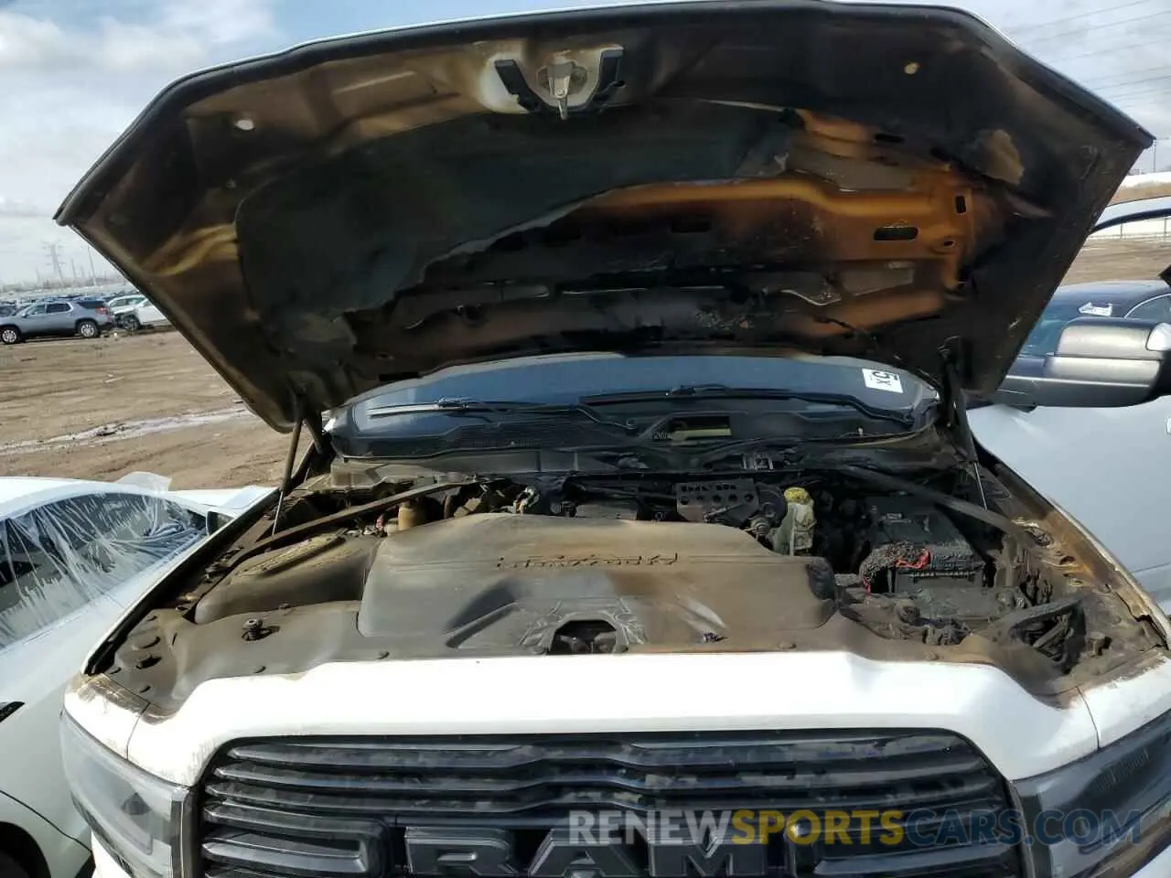 11 Photograph of a damaged car 3C6UR5FL5NG299405 RAM 2500 2022