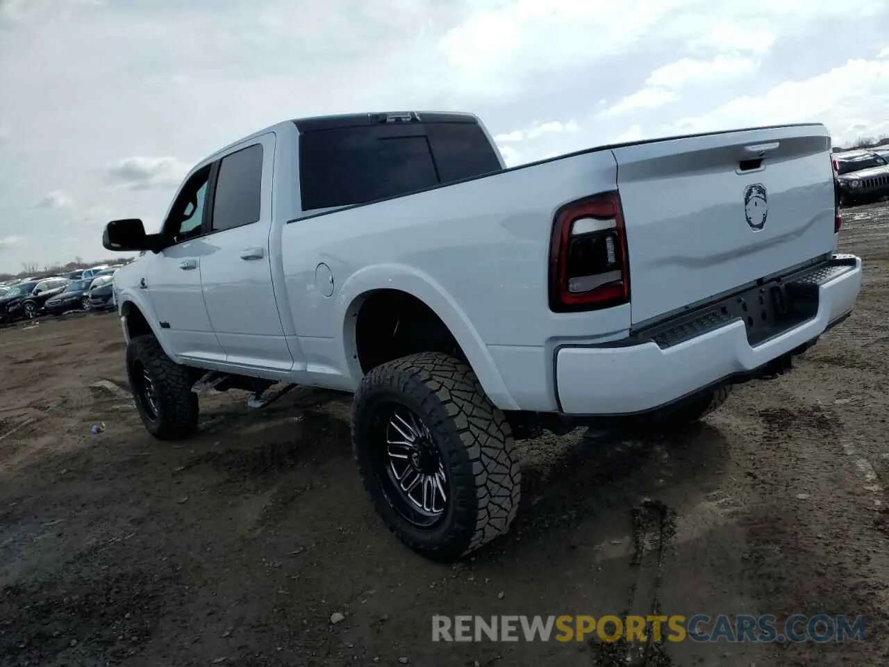 2 Photograph of a damaged car 3C6UR5FL5NG299405 RAM 2500 2022