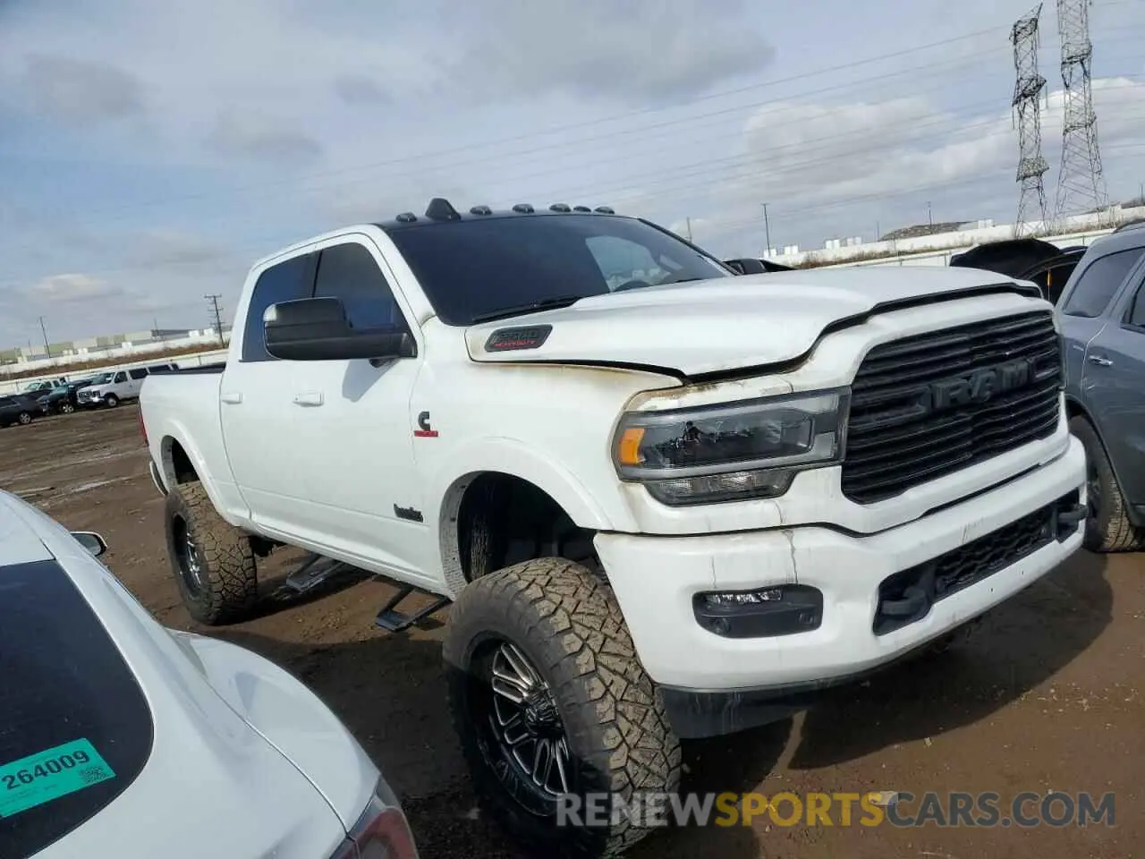 4 Photograph of a damaged car 3C6UR5FL5NG299405 RAM 2500 2022