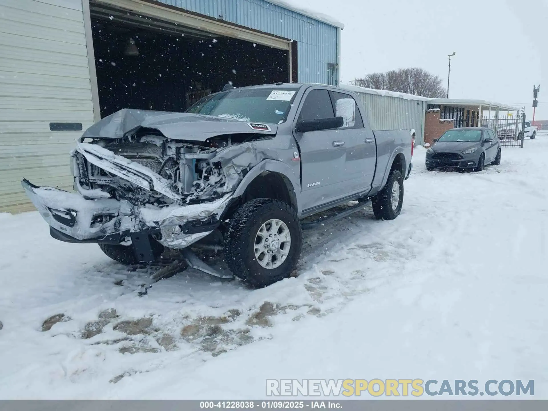 2 Photograph of a damaged car 3C6UR5FL6NG184134 RAM 2500 2022