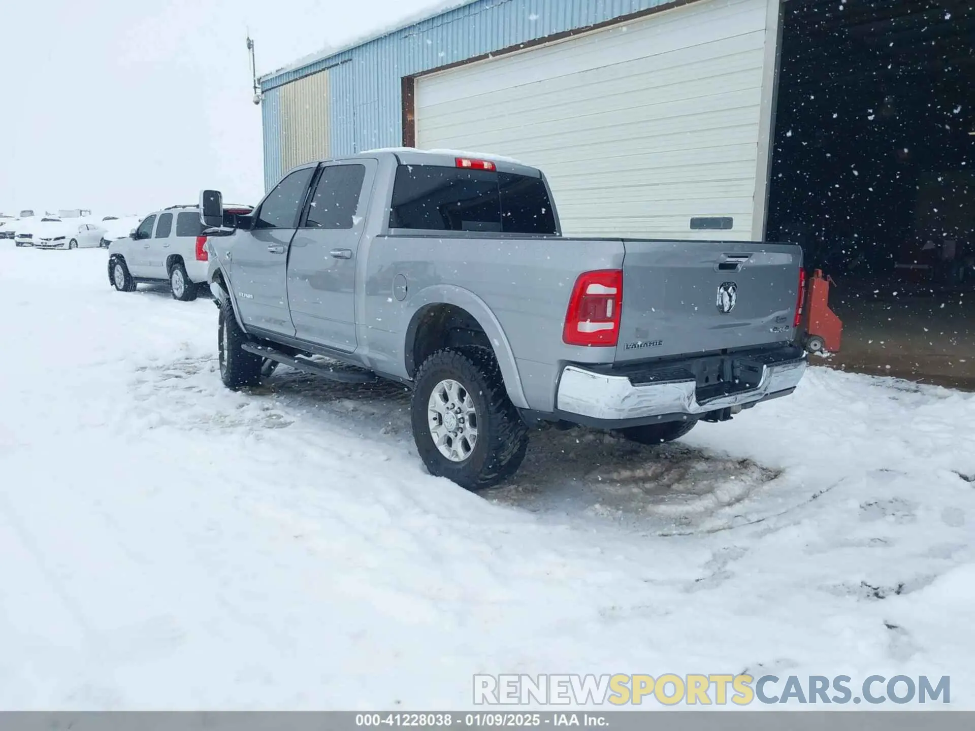 3 Photograph of a damaged car 3C6UR5FL6NG184134 RAM 2500 2022