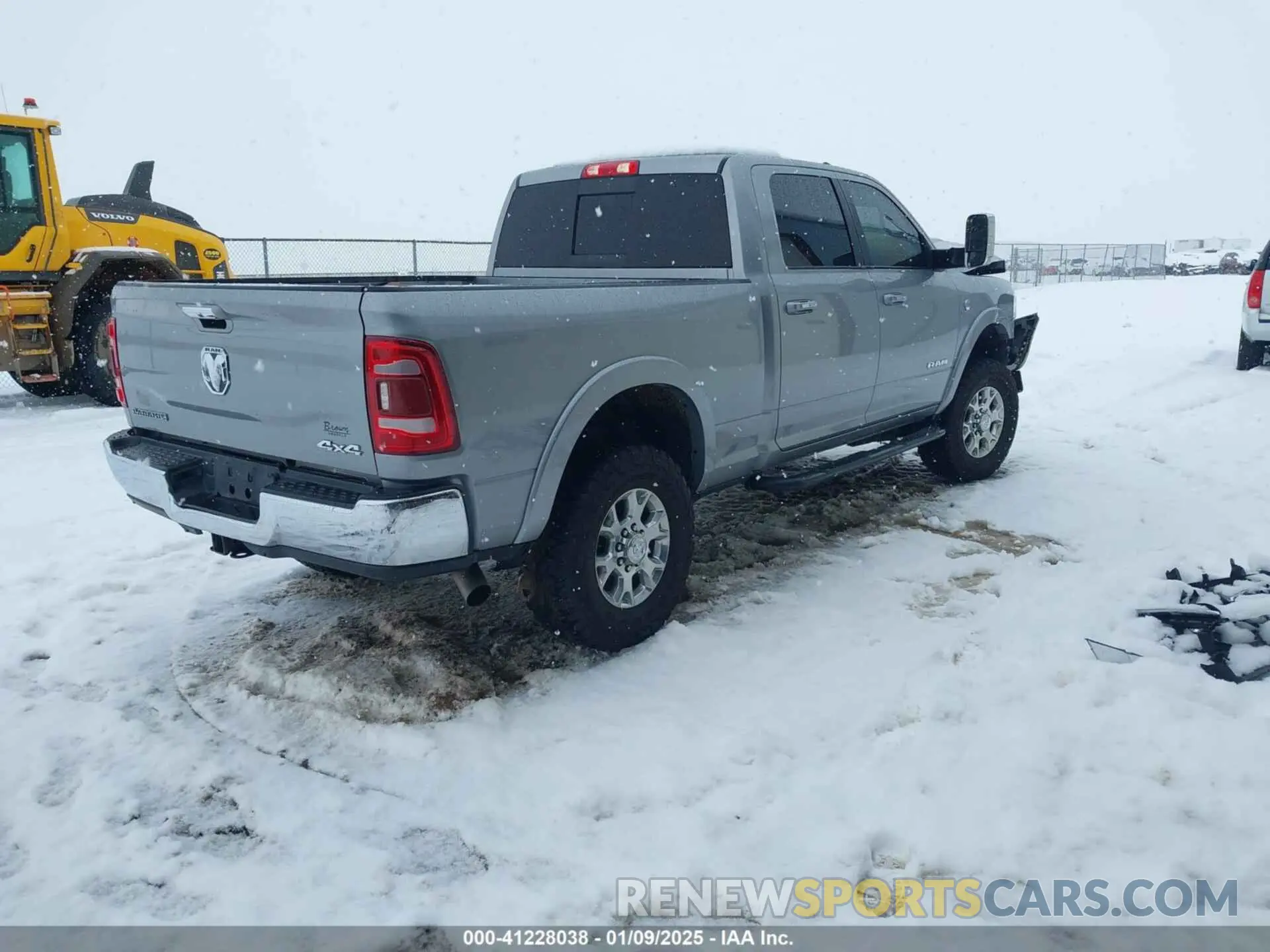 4 Photograph of a damaged car 3C6UR5FL6NG184134 RAM 2500 2022