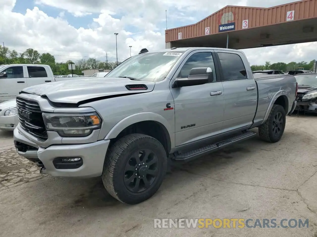 1 Photograph of a damaged car 3C6UR5FL6NG261617 RAM 2500 2022