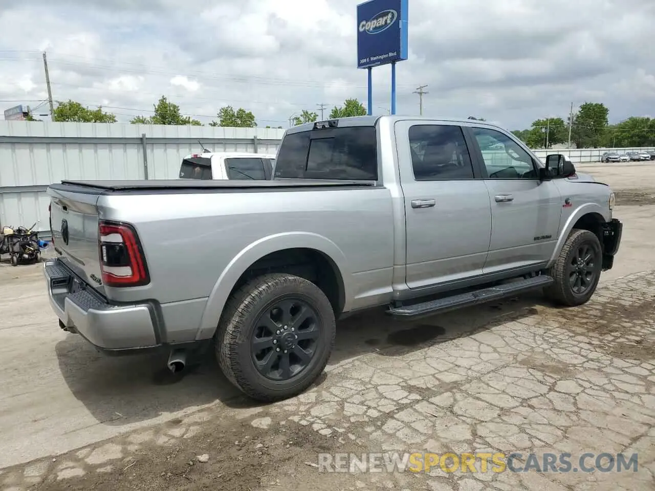 3 Photograph of a damaged car 3C6UR5FL6NG261617 RAM 2500 2022