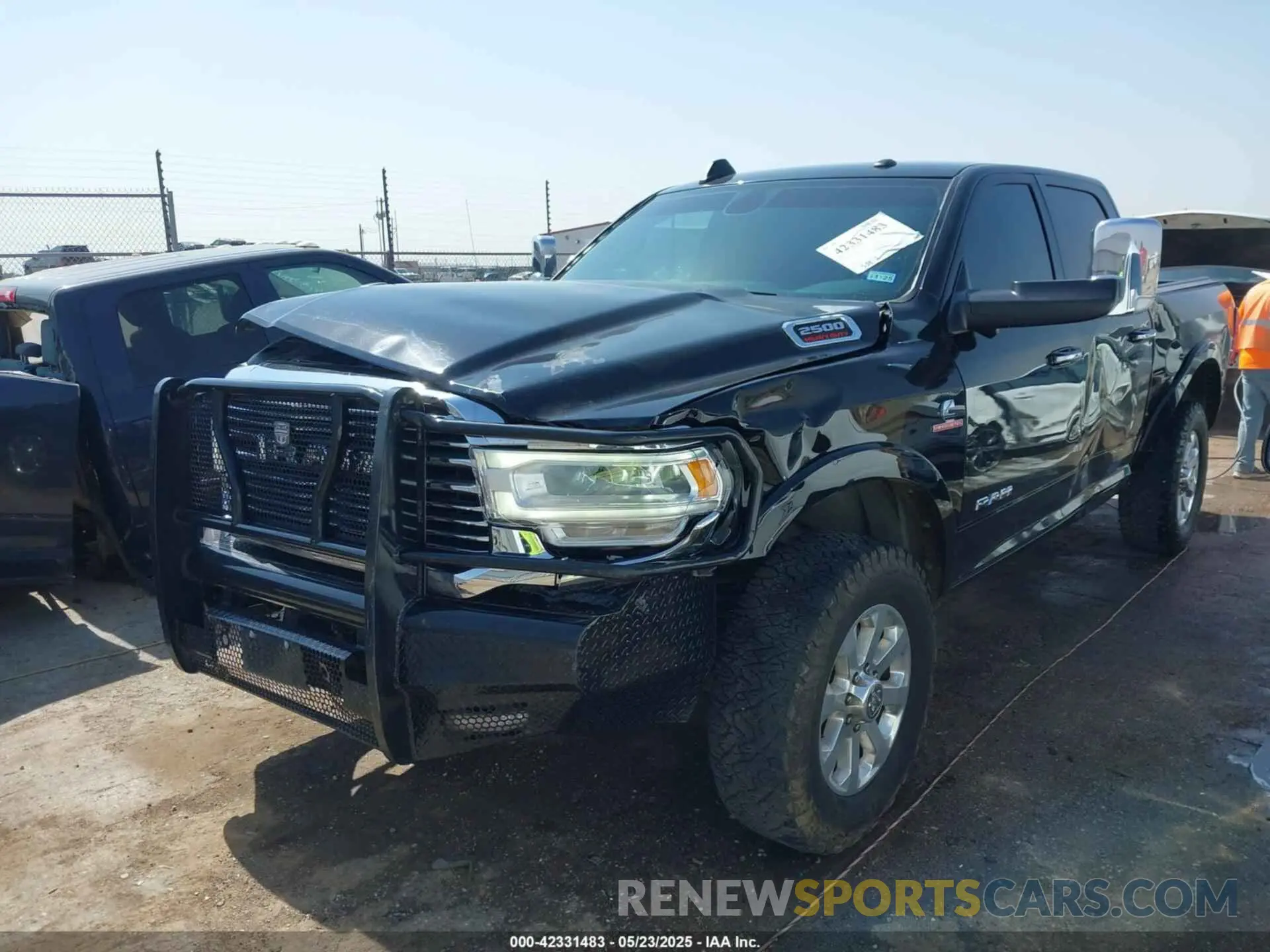 2 Photograph of a damaged car 3C6UR5FL6NG361636 RAM 2500 2022