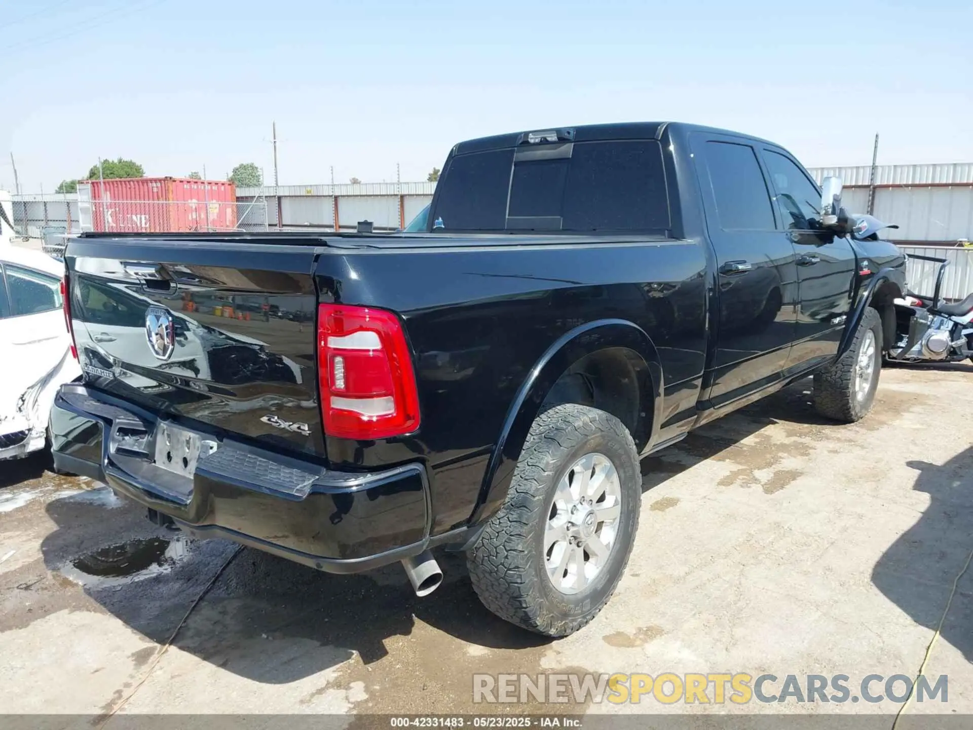 4 Photograph of a damaged car 3C6UR5FL6NG361636 RAM 2500 2022
