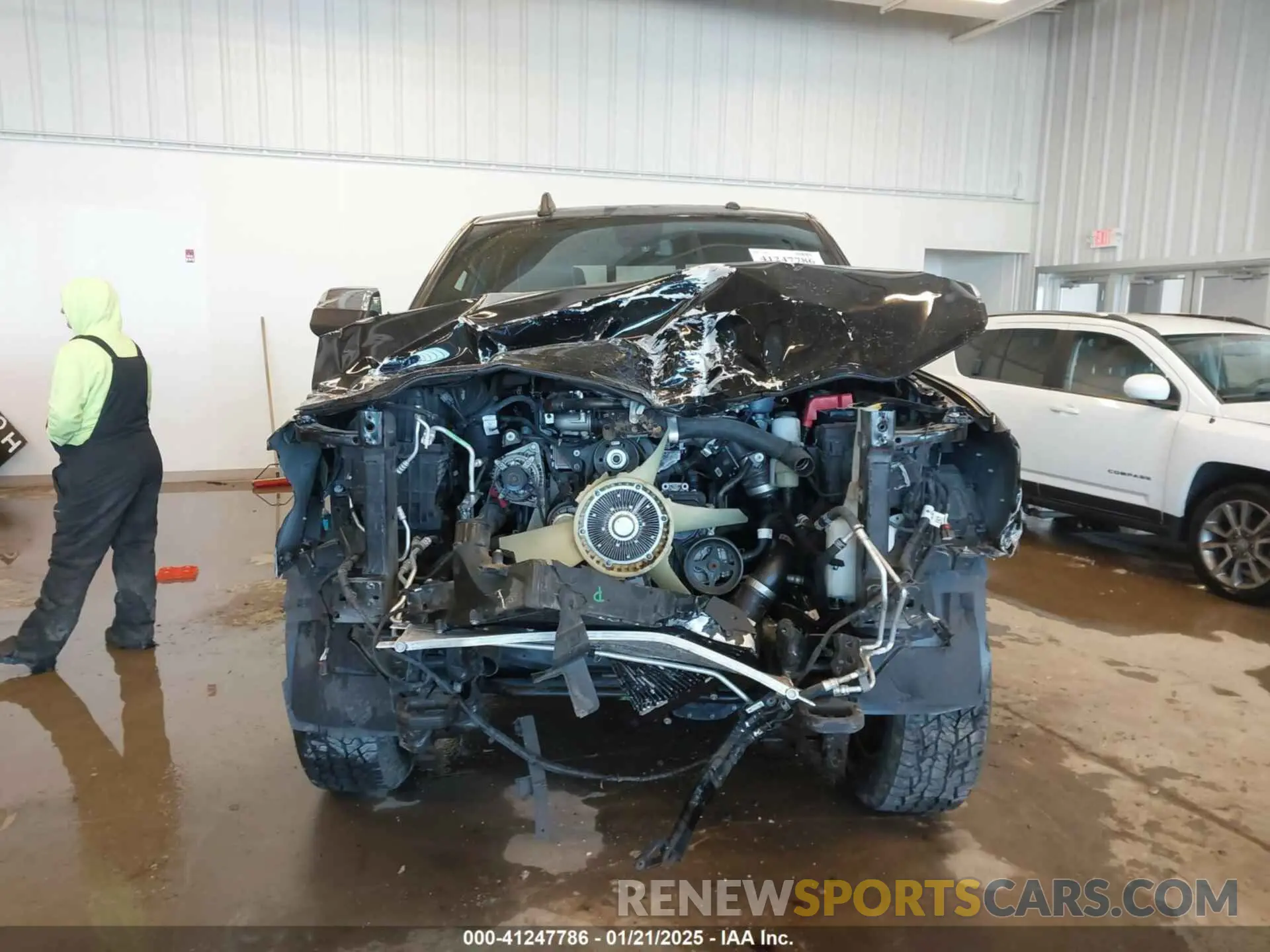 13 Photograph of a damaged car 3C6UR5FL6NG368022 RAM 2500 2022