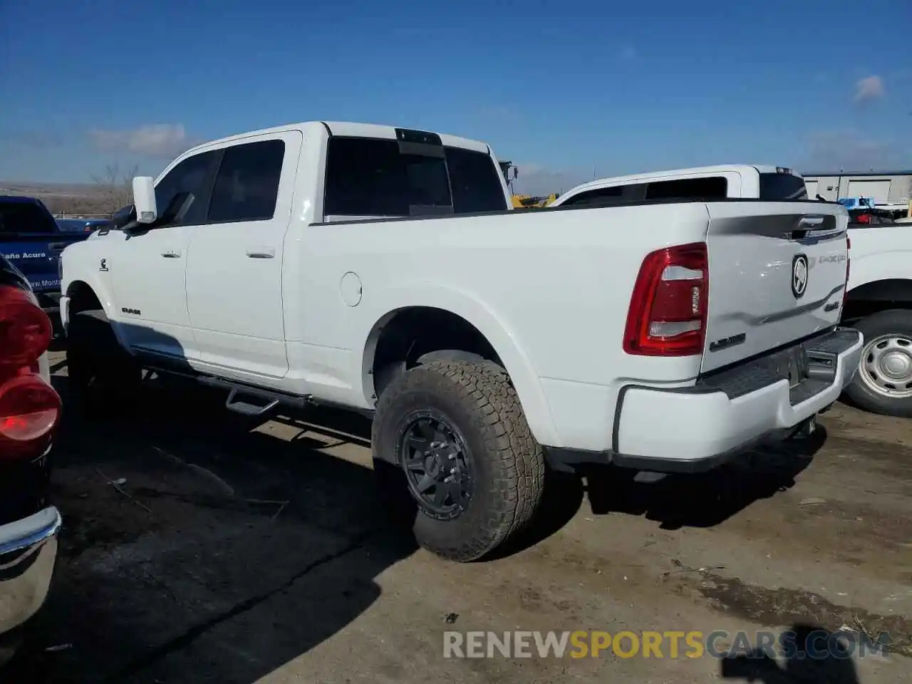 2 Photograph of a damaged car 3C6UR5FL7NG128025 RAM 2500 2022