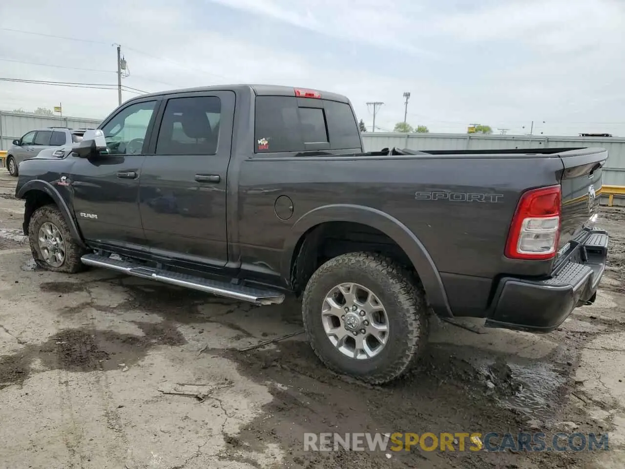 2 Photograph of a damaged car 3C6UR5FL7NG282931 RAM 2500 2022