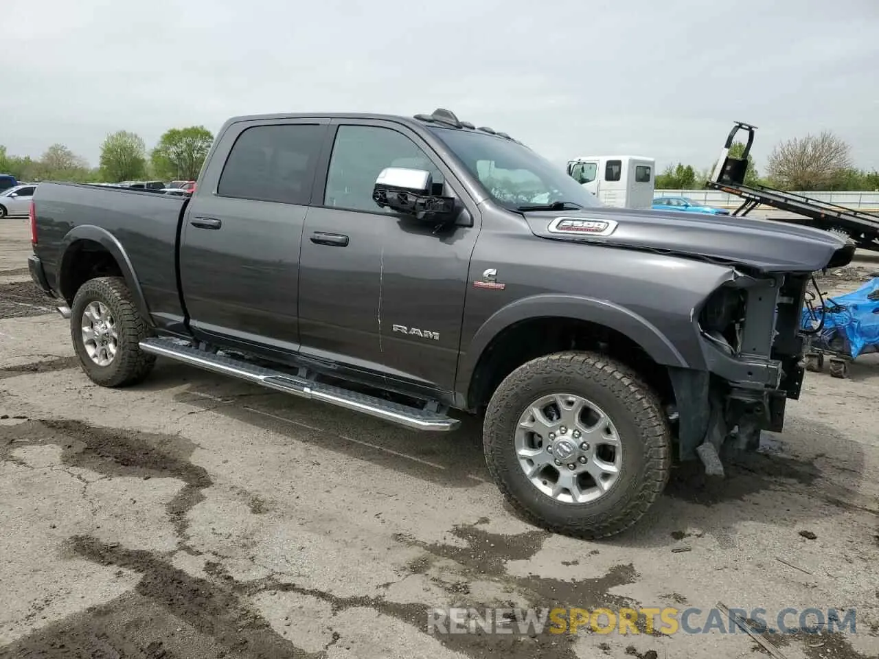 4 Photograph of a damaged car 3C6UR5FL7NG282931 RAM 2500 2022