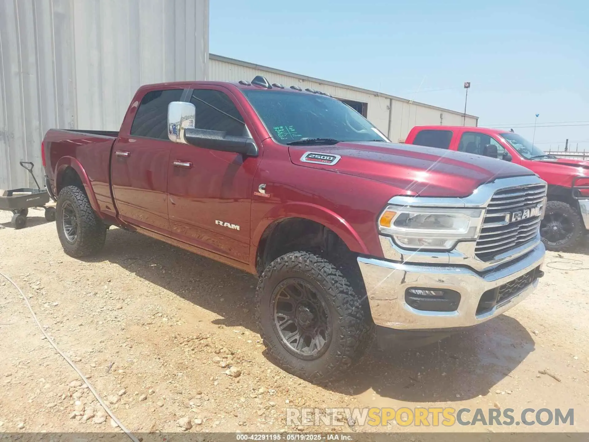 1 Photograph of a damaged car 3C6UR5FL7NG305818 RAM 2500 2022