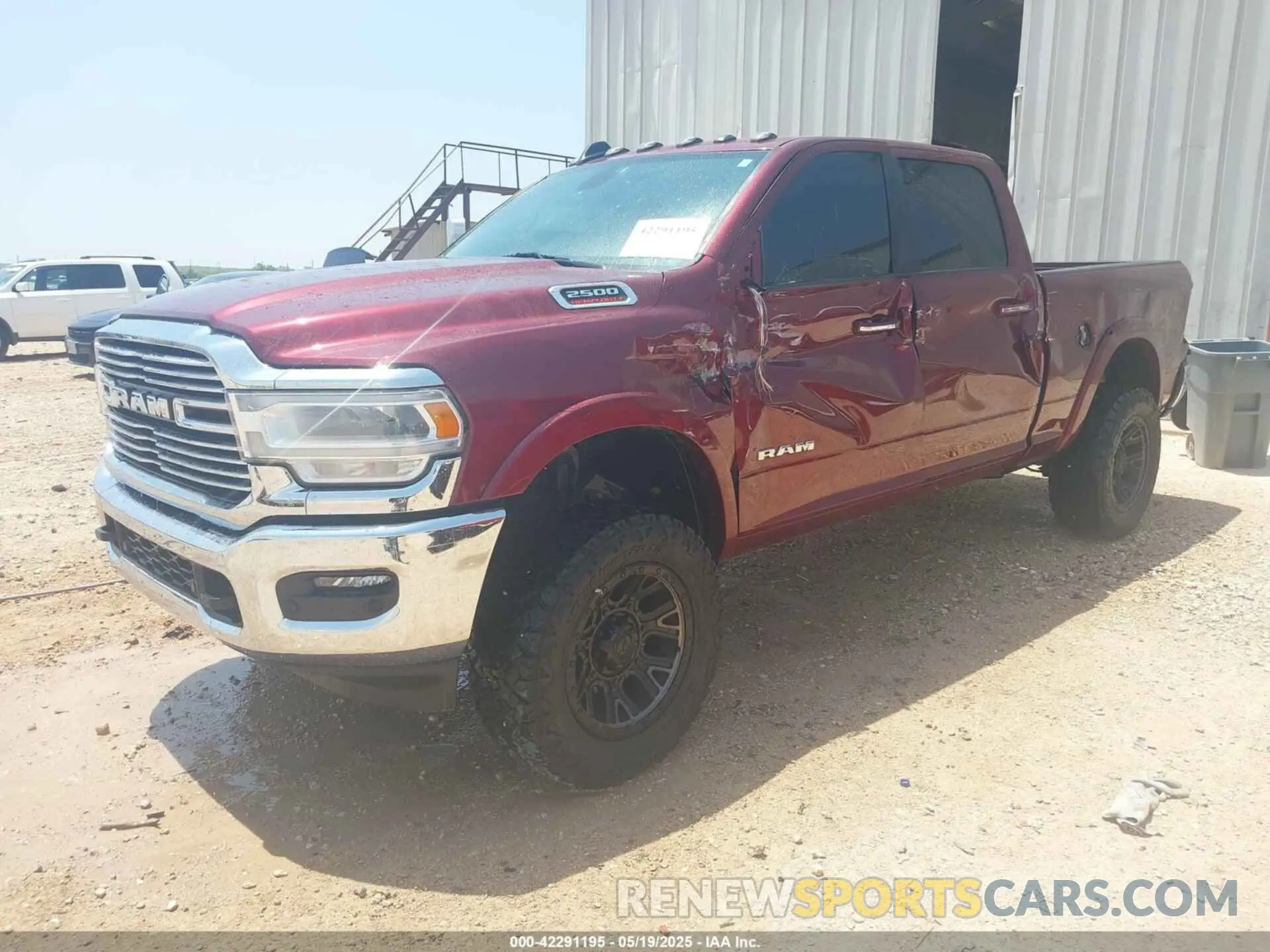 2 Photograph of a damaged car 3C6UR5FL7NG305818 RAM 2500 2022