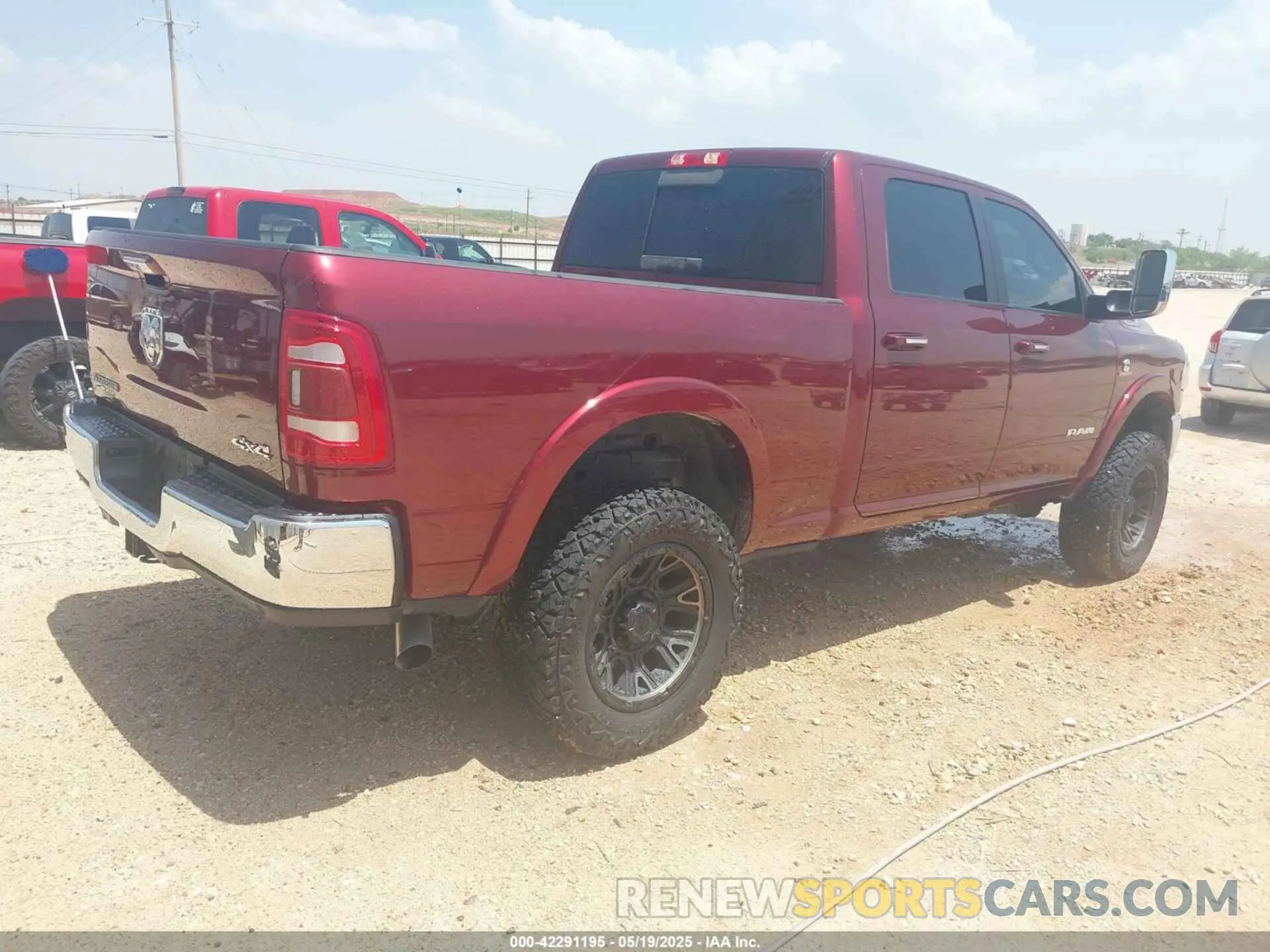 4 Photograph of a damaged car 3C6UR5FL7NG305818 RAM 2500 2022