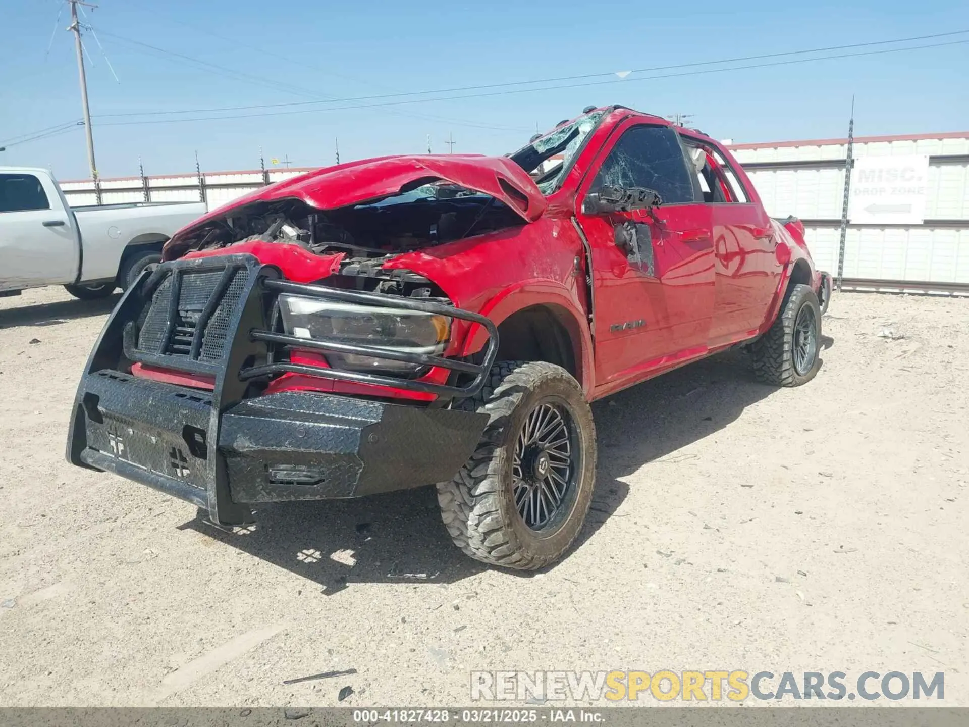 2 Photograph of a damaged car 3C6UR5FL7NG327138 RAM 2500 2022