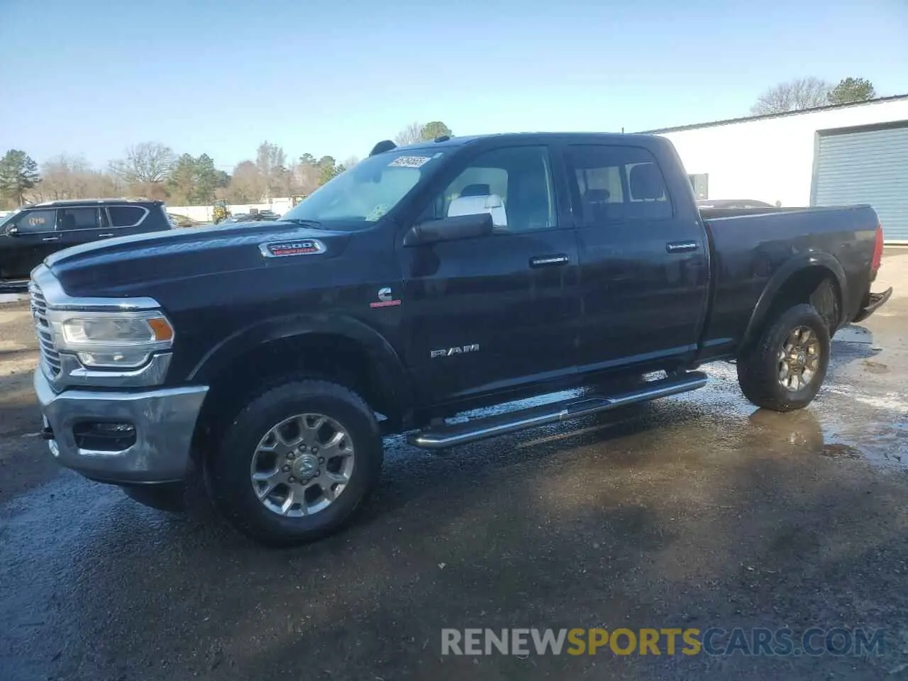 1 Photograph of a damaged car 3C6UR5FL7NG386965 RAM 2500 2022