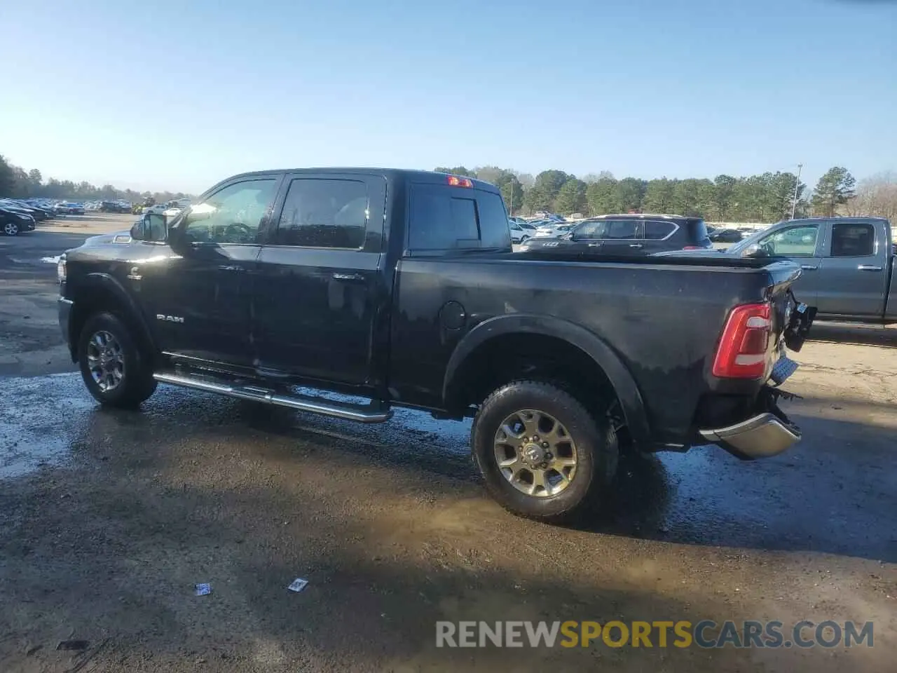 2 Photograph of a damaged car 3C6UR5FL7NG386965 RAM 2500 2022
