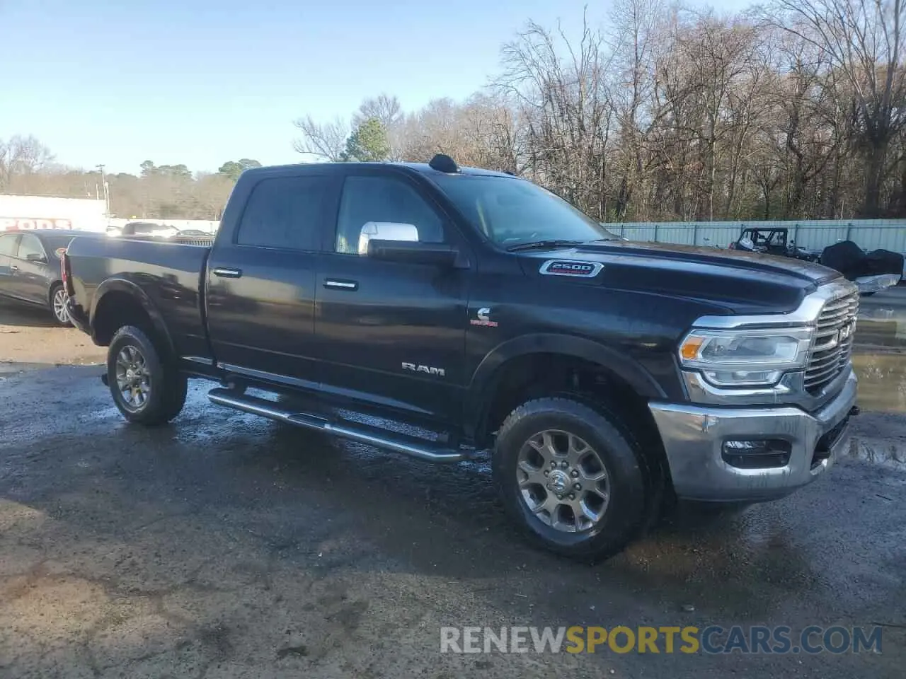 4 Photograph of a damaged car 3C6UR5FL7NG386965 RAM 2500 2022