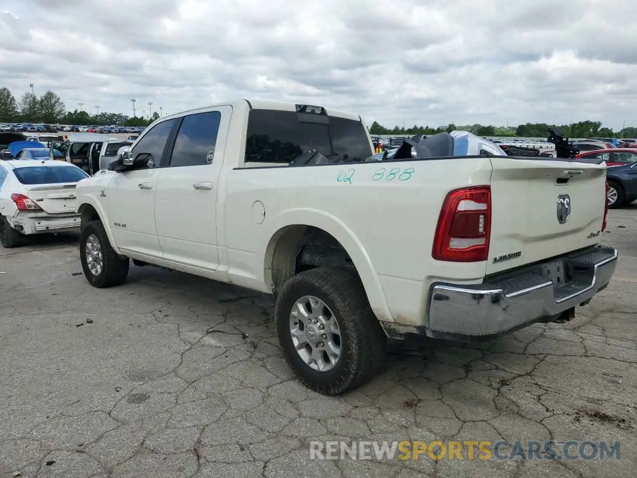 2 Photograph of a damaged car 3C6UR5FL8NG328556 RAM 2500 2022