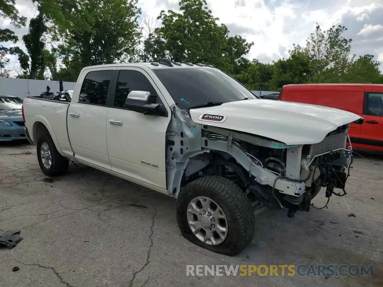 4 Photograph of a damaged car 3C6UR5FL8NG328556 RAM 2500 2022