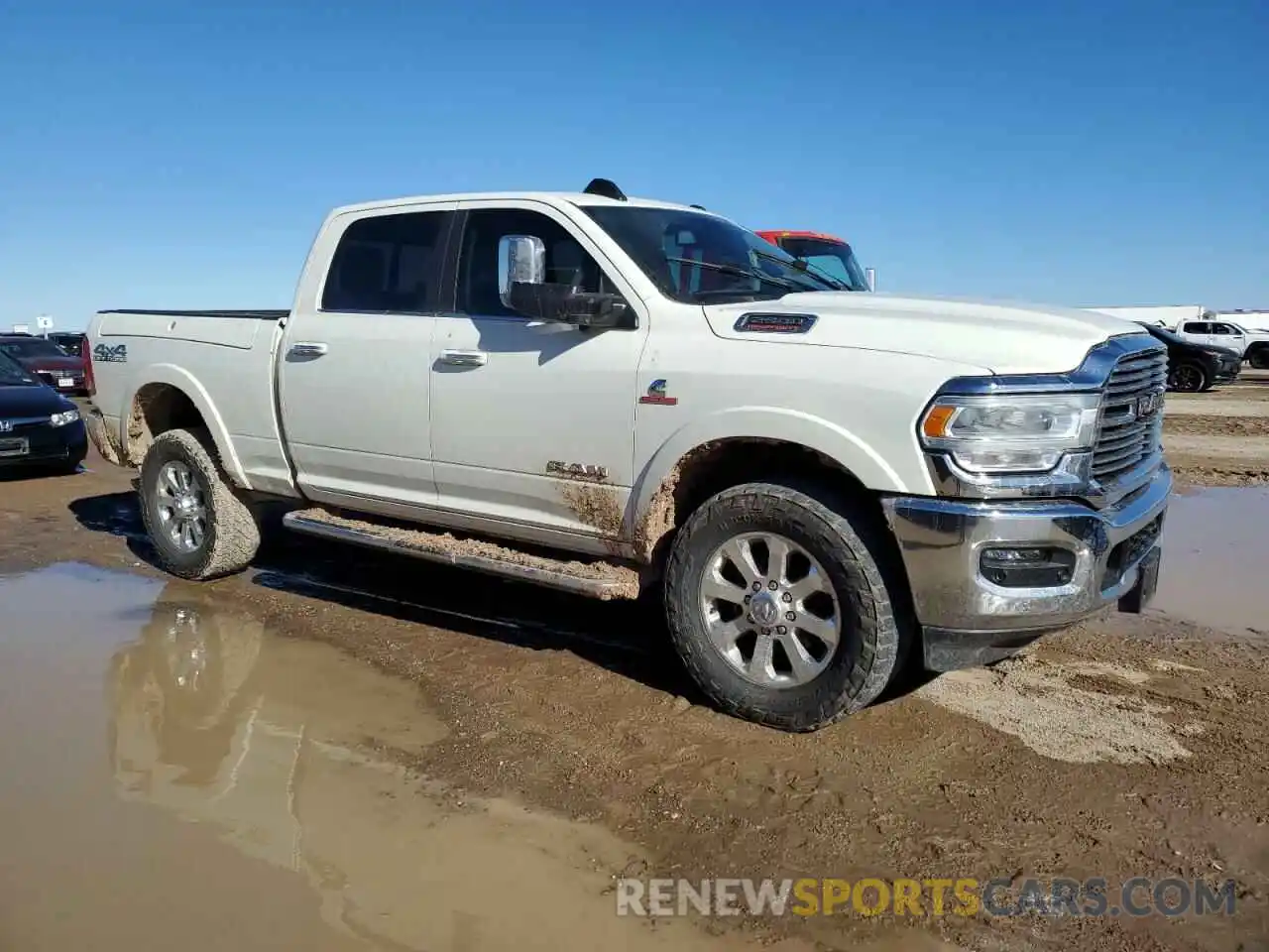 4 Photograph of a damaged car 3C6UR5FLXNG337467 RAM 2500 2022