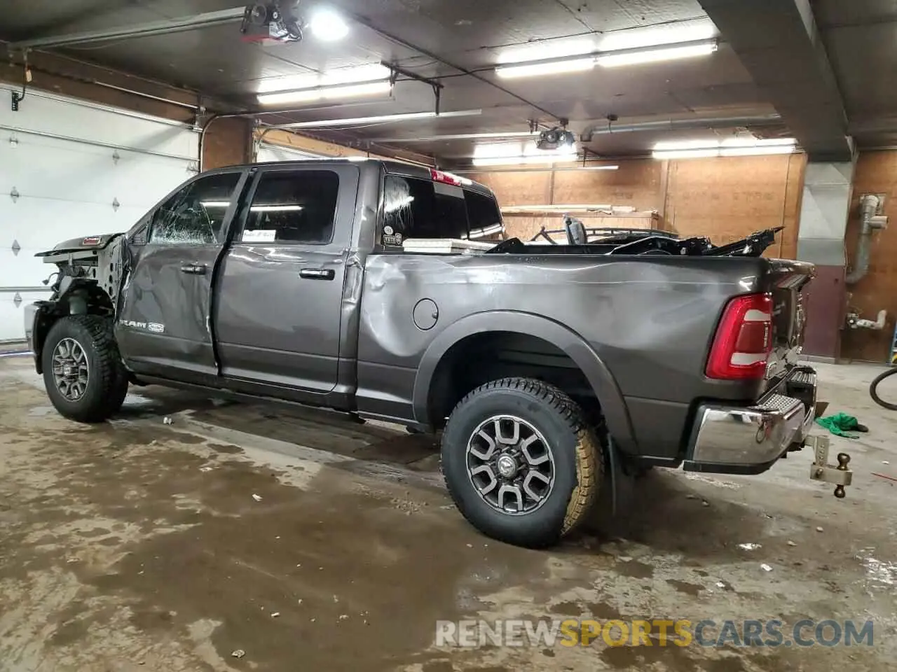 2 Photograph of a damaged car 3C6UR5GL8NG193514 RAM 2500 2022