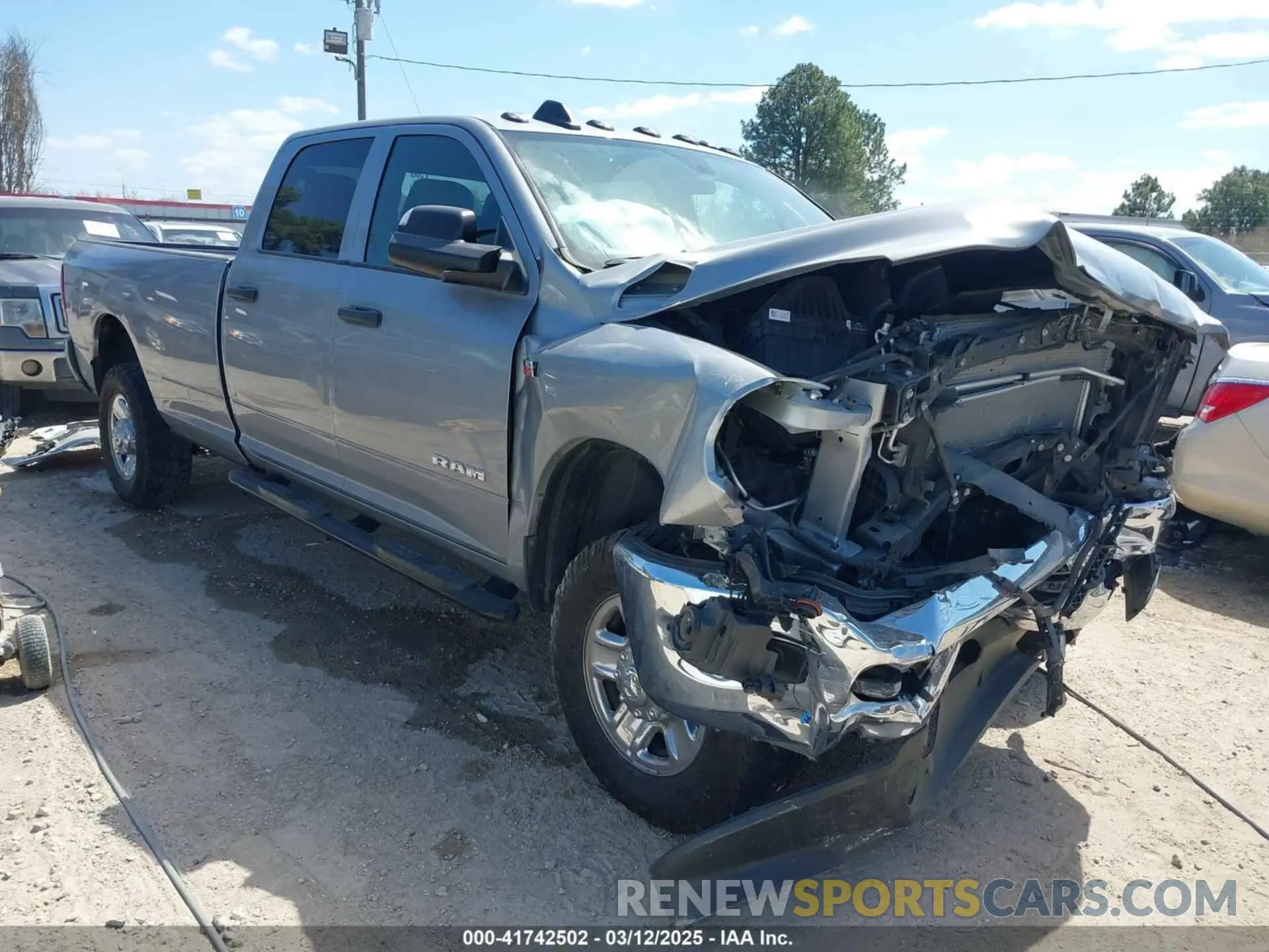 1 Photograph of a damaged car 3C6UR5HJ0NG118075 RAM 2500 2022