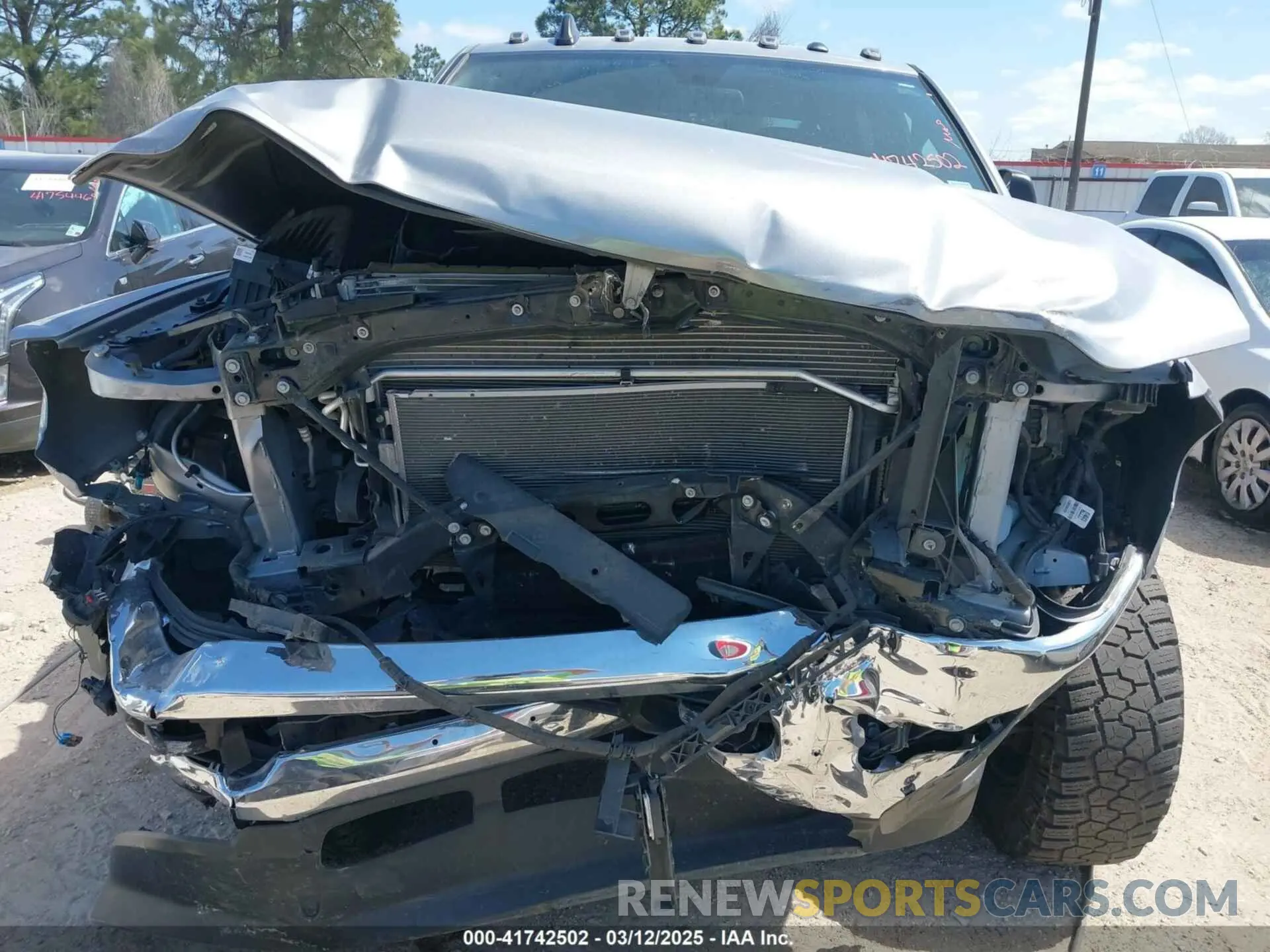13 Photograph of a damaged car 3C6UR5HJ0NG118075 RAM 2500 2022
