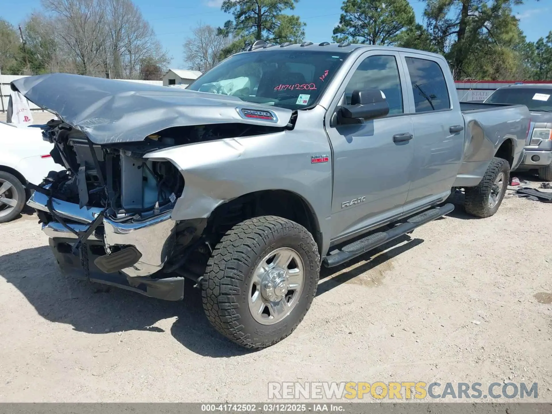 2 Photograph of a damaged car 3C6UR5HJ0NG118075 RAM 2500 2022