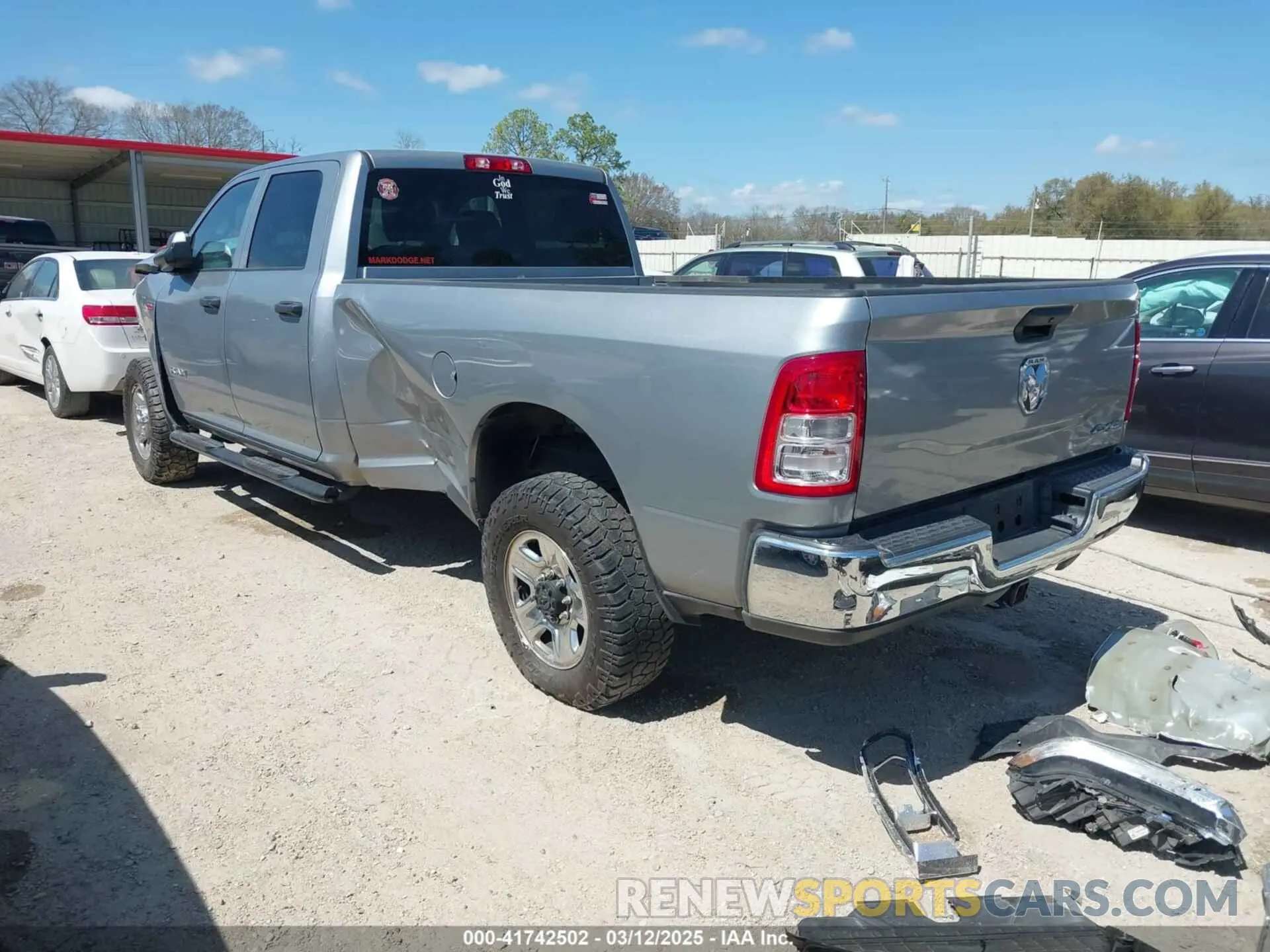 3 Photograph of a damaged car 3C6UR5HJ0NG118075 RAM 2500 2022