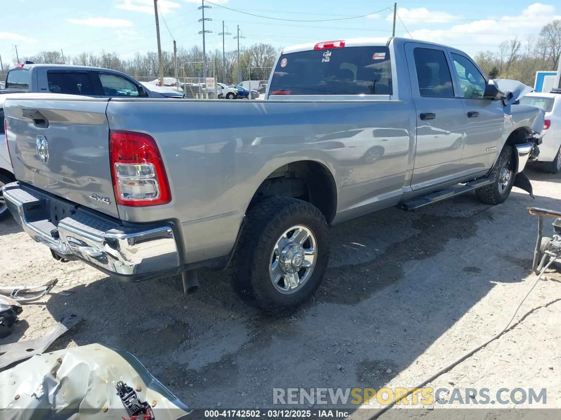 4 Photograph of a damaged car 3C6UR5HJ0NG118075 RAM 2500 2022