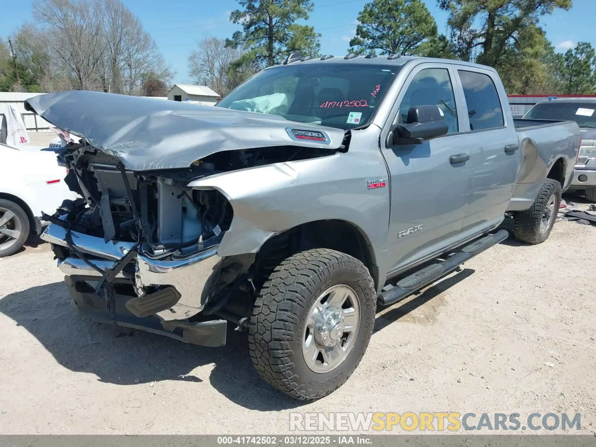 6 Photograph of a damaged car 3C6UR5HJ0NG118075 RAM 2500 2022