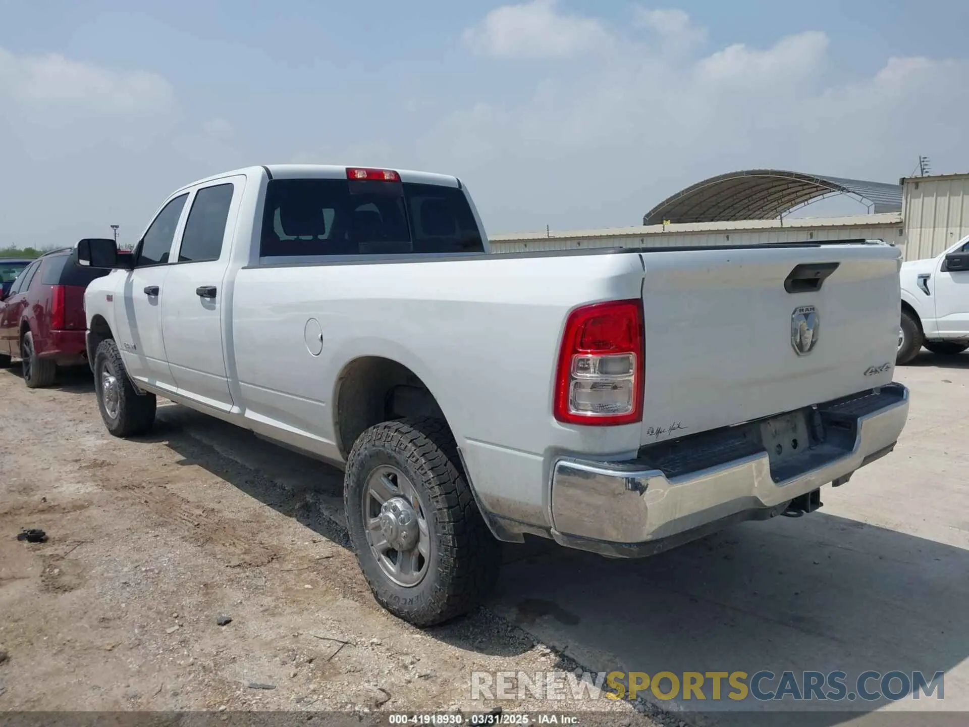 3 Photograph of a damaged car 3C6UR5HJ0NG125804 RAM 2500 2022