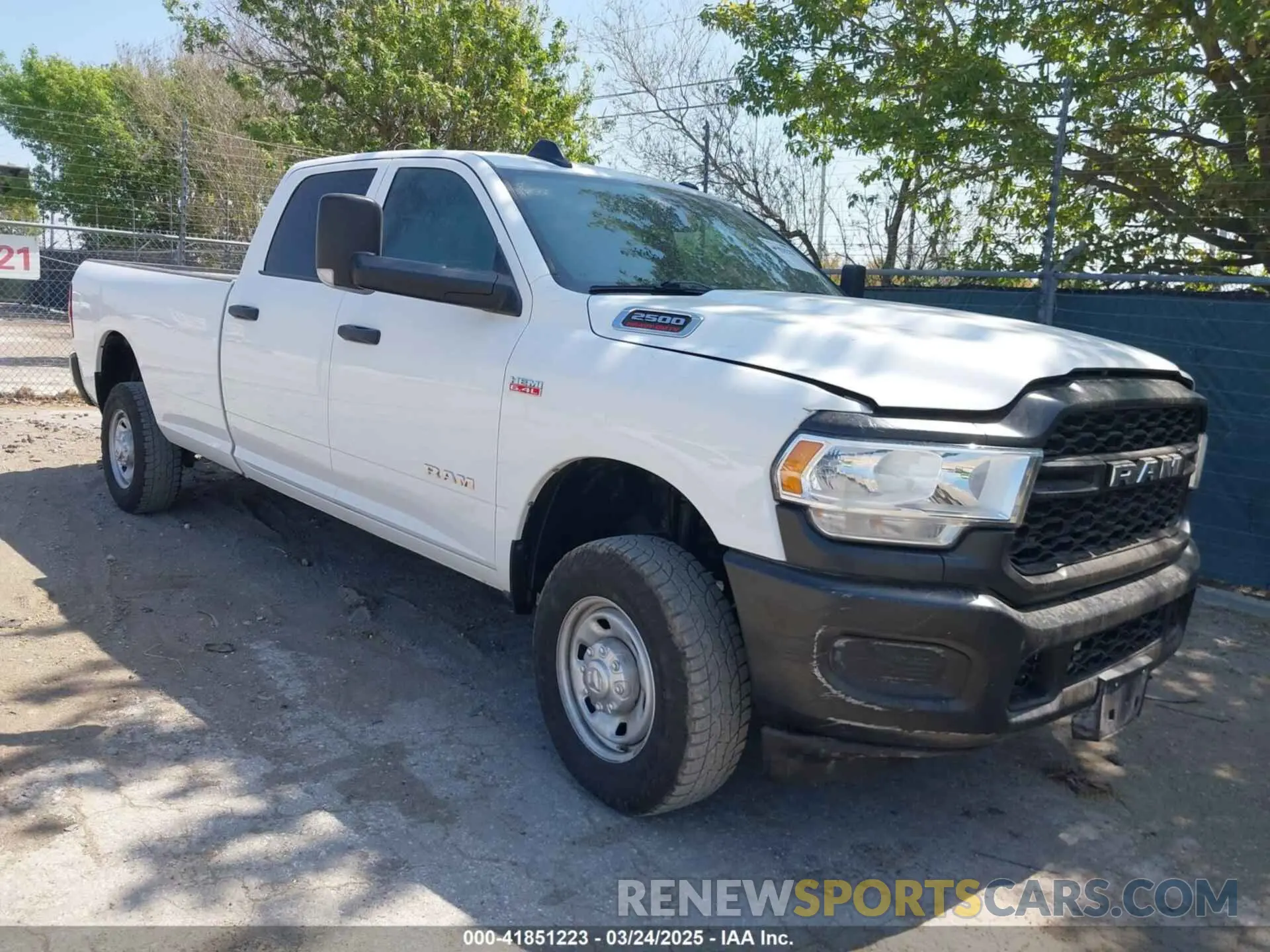 1 Photograph of a damaged car 3C6UR5HJ1NG202731 RAM 2500 2022