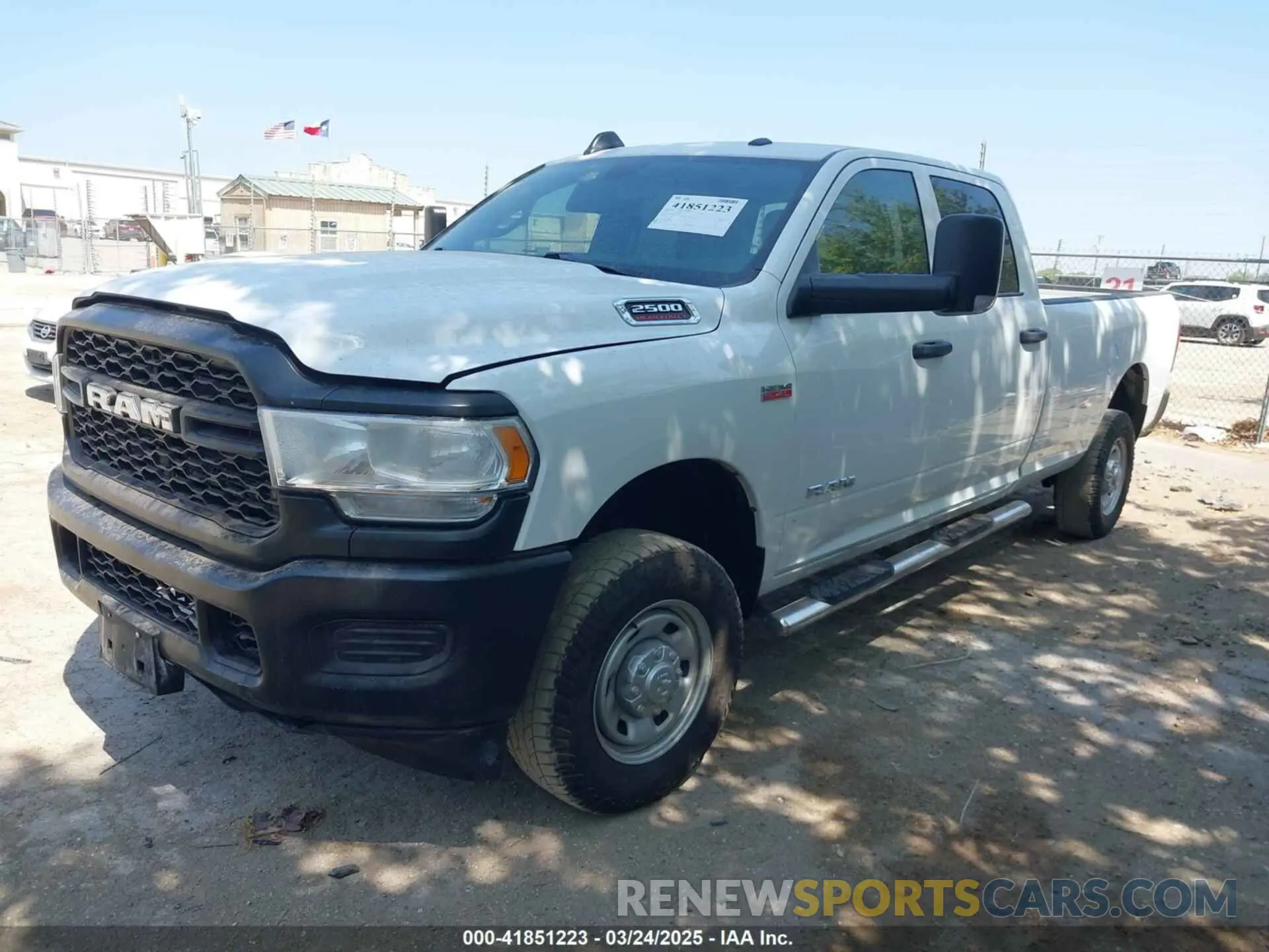 2 Photograph of a damaged car 3C6UR5HJ1NG202731 RAM 2500 2022