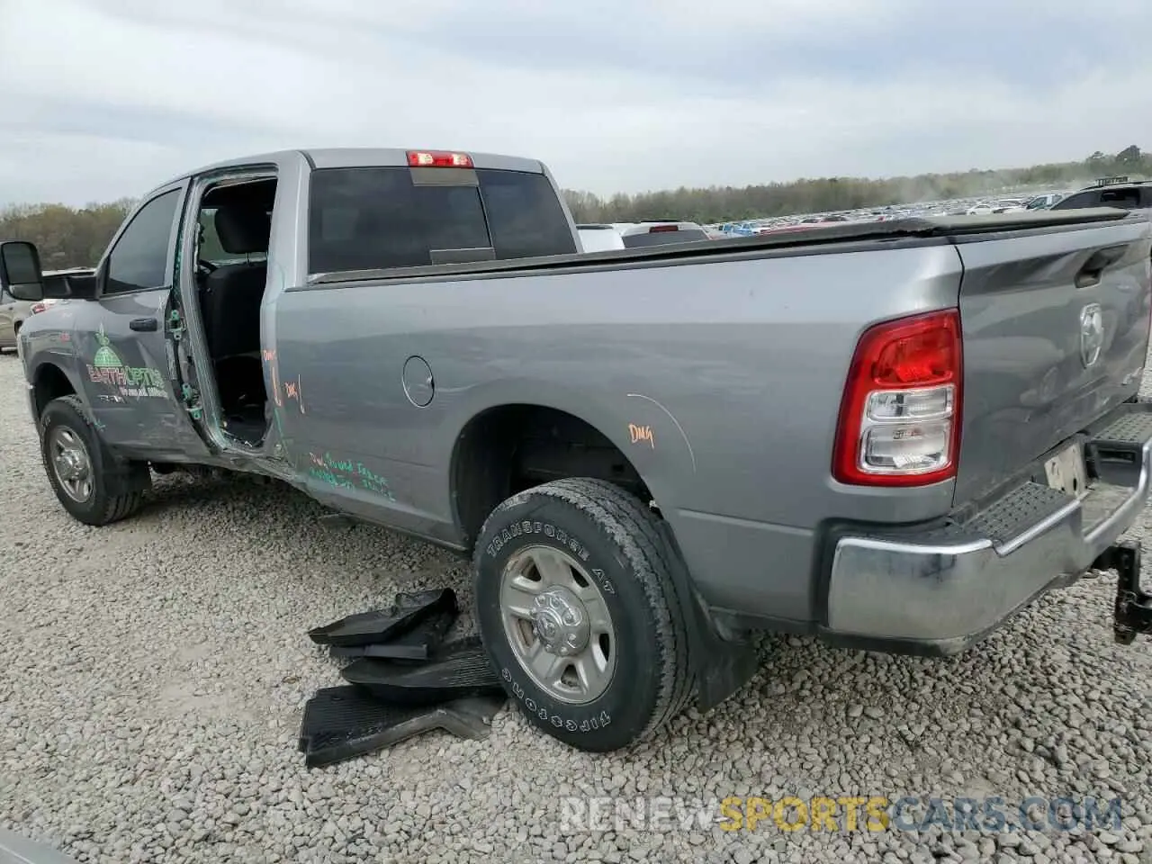 2 Photograph of a damaged car 3C6UR5HJ1NG361944 RAM 2500 2022