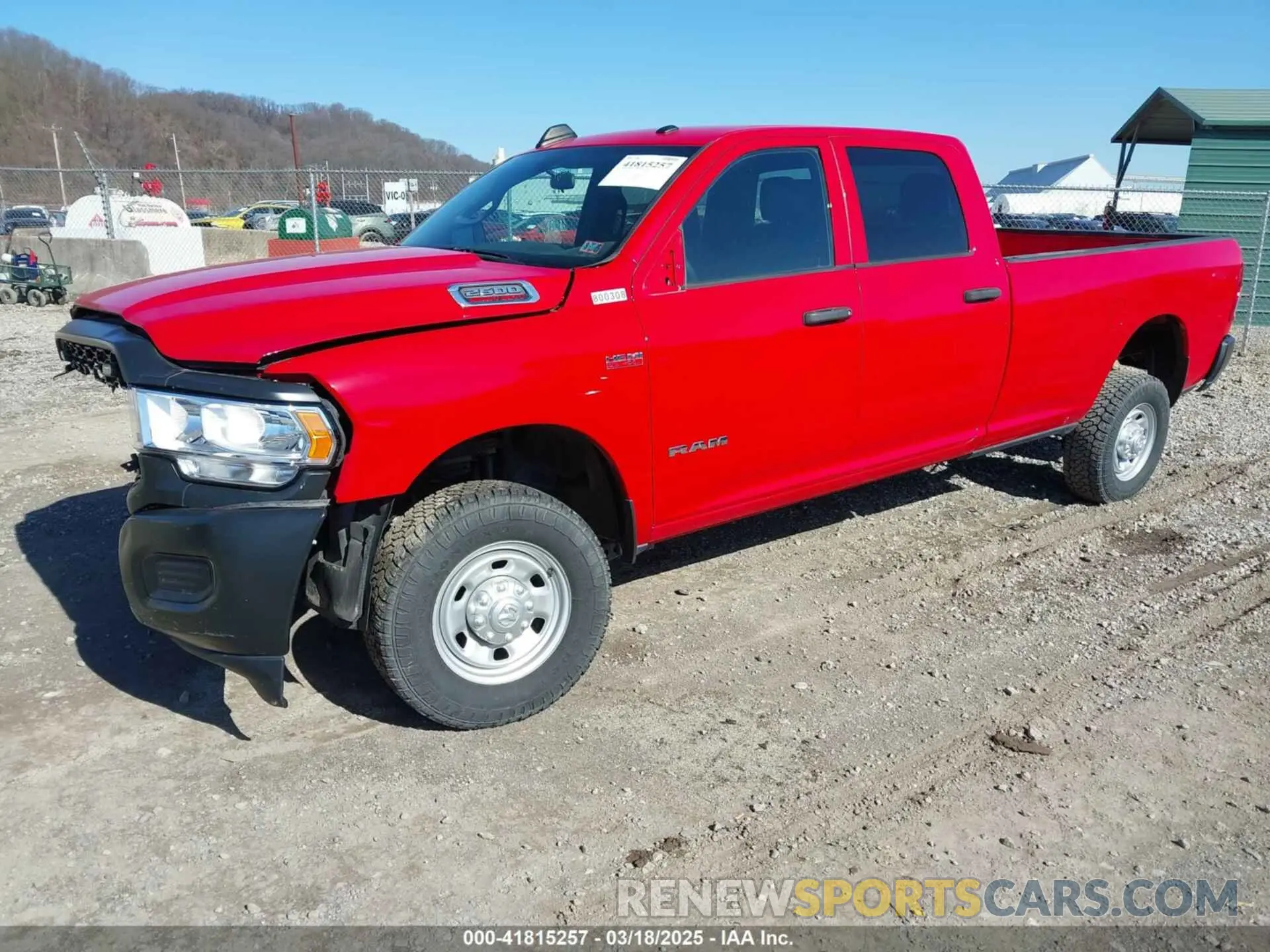 2 Photograph of a damaged car 3C6UR5HJ1NG365279 RAM 2500 2022