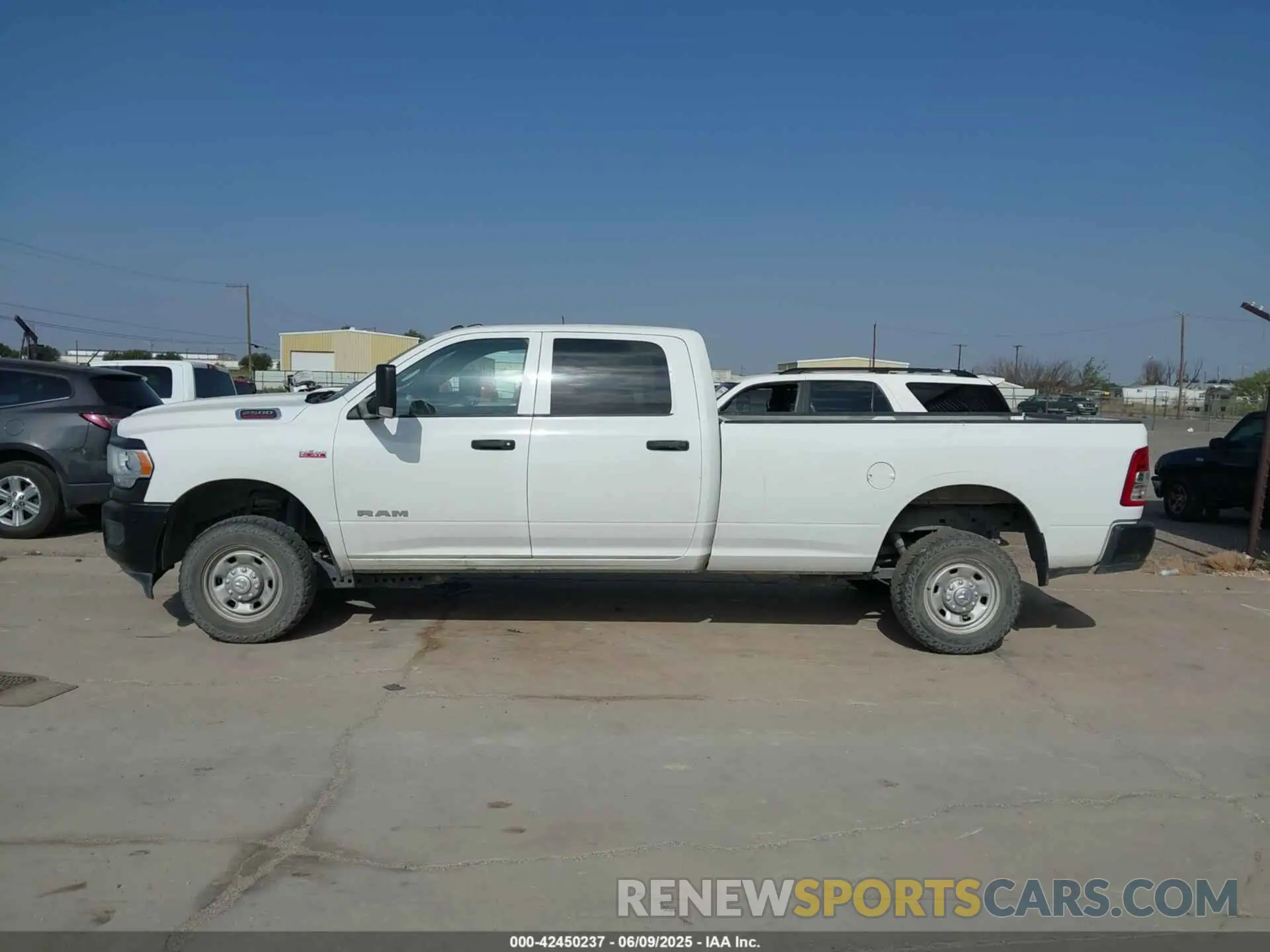 14 Photograph of a damaged car 3C6UR5HJ2NG202690 RAM 2500 2022