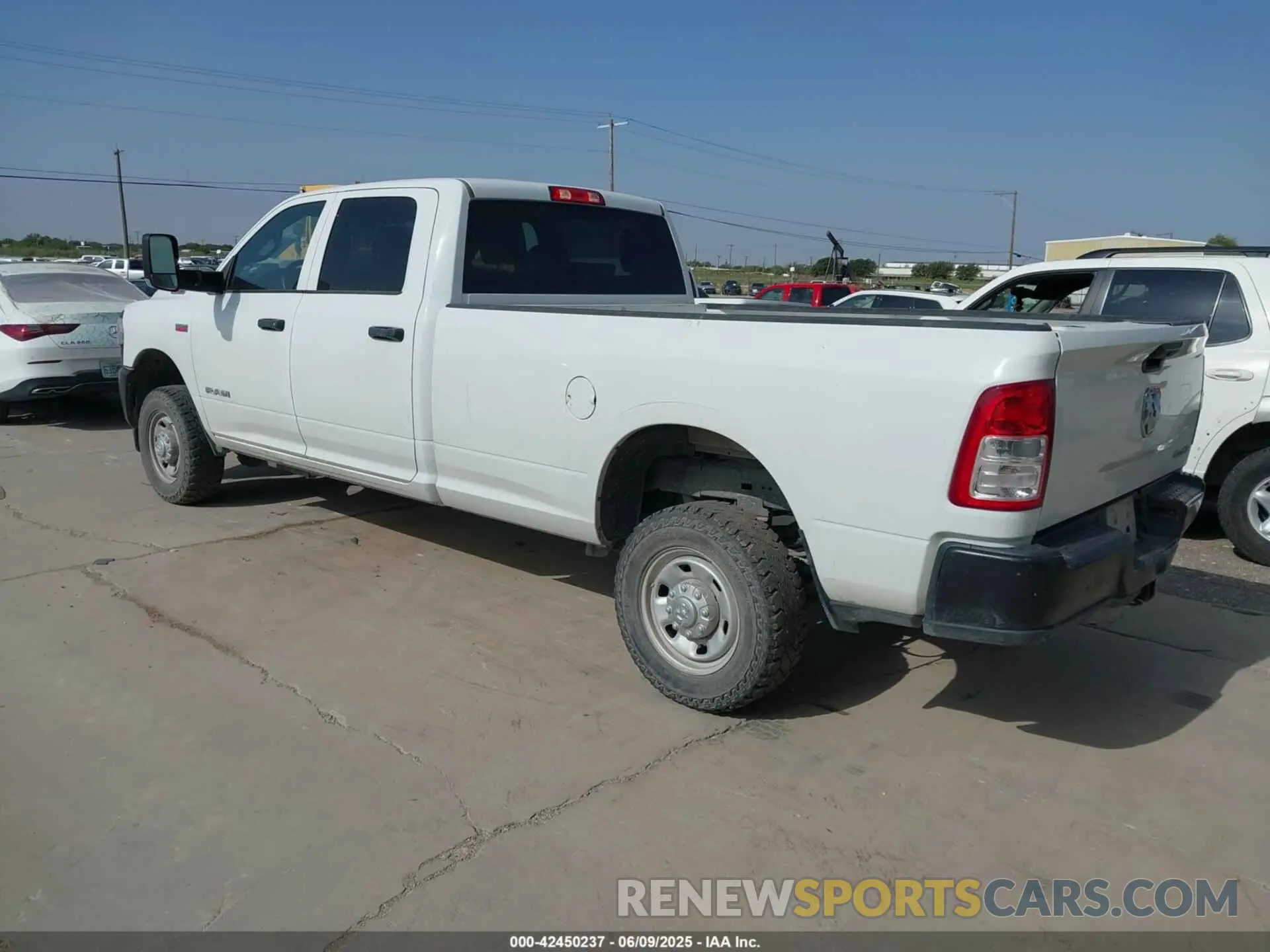 3 Photograph of a damaged car 3C6UR5HJ2NG202690 RAM 2500 2022