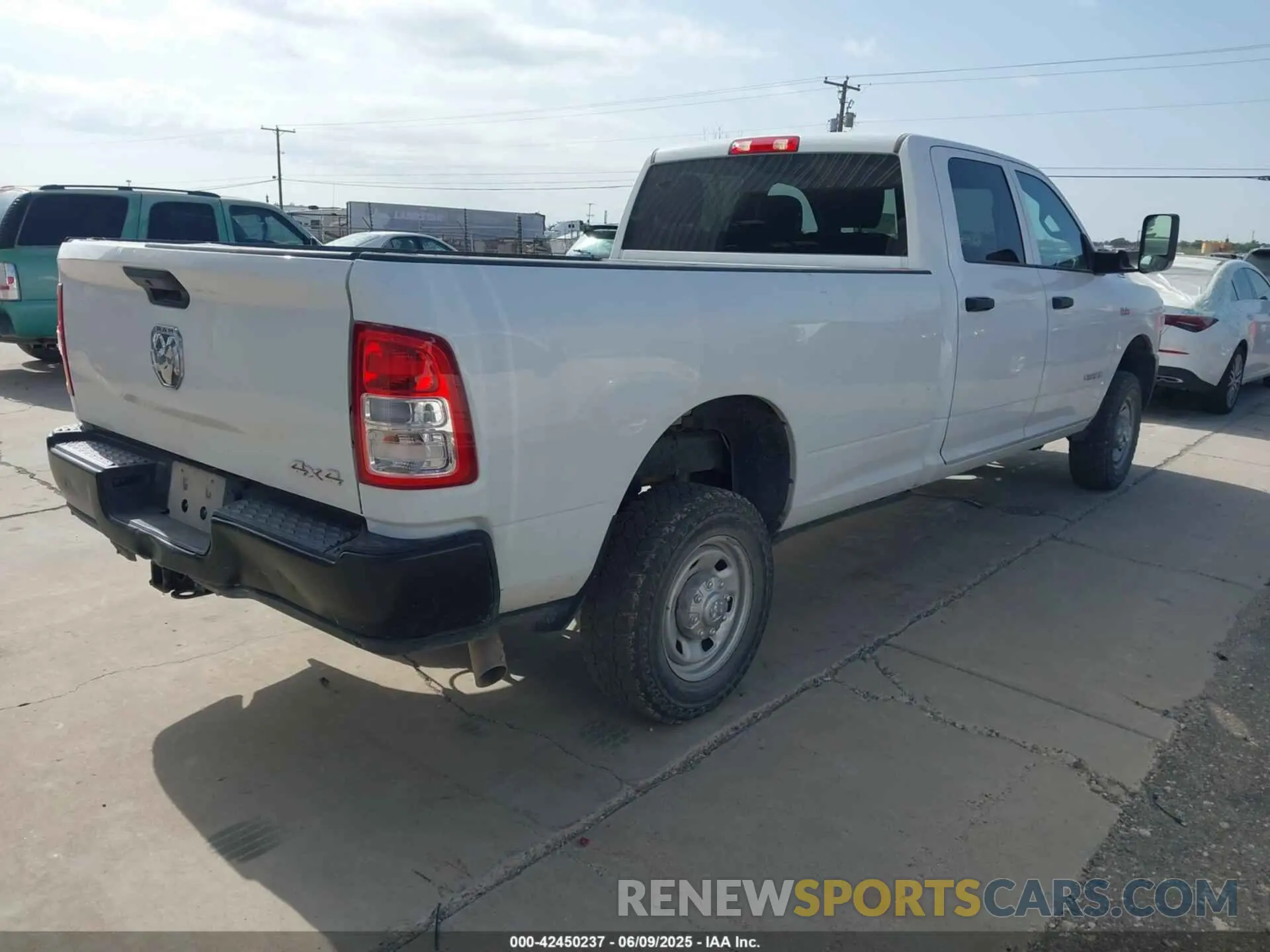 4 Photograph of a damaged car 3C6UR5HJ2NG202690 RAM 2500 2022