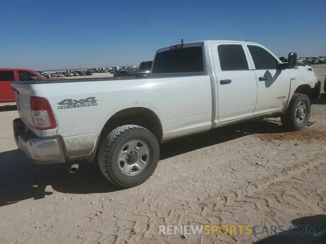 3 Photograph of a damaged car 3C6UR5HJ2NG366442 RAM 2500 2022