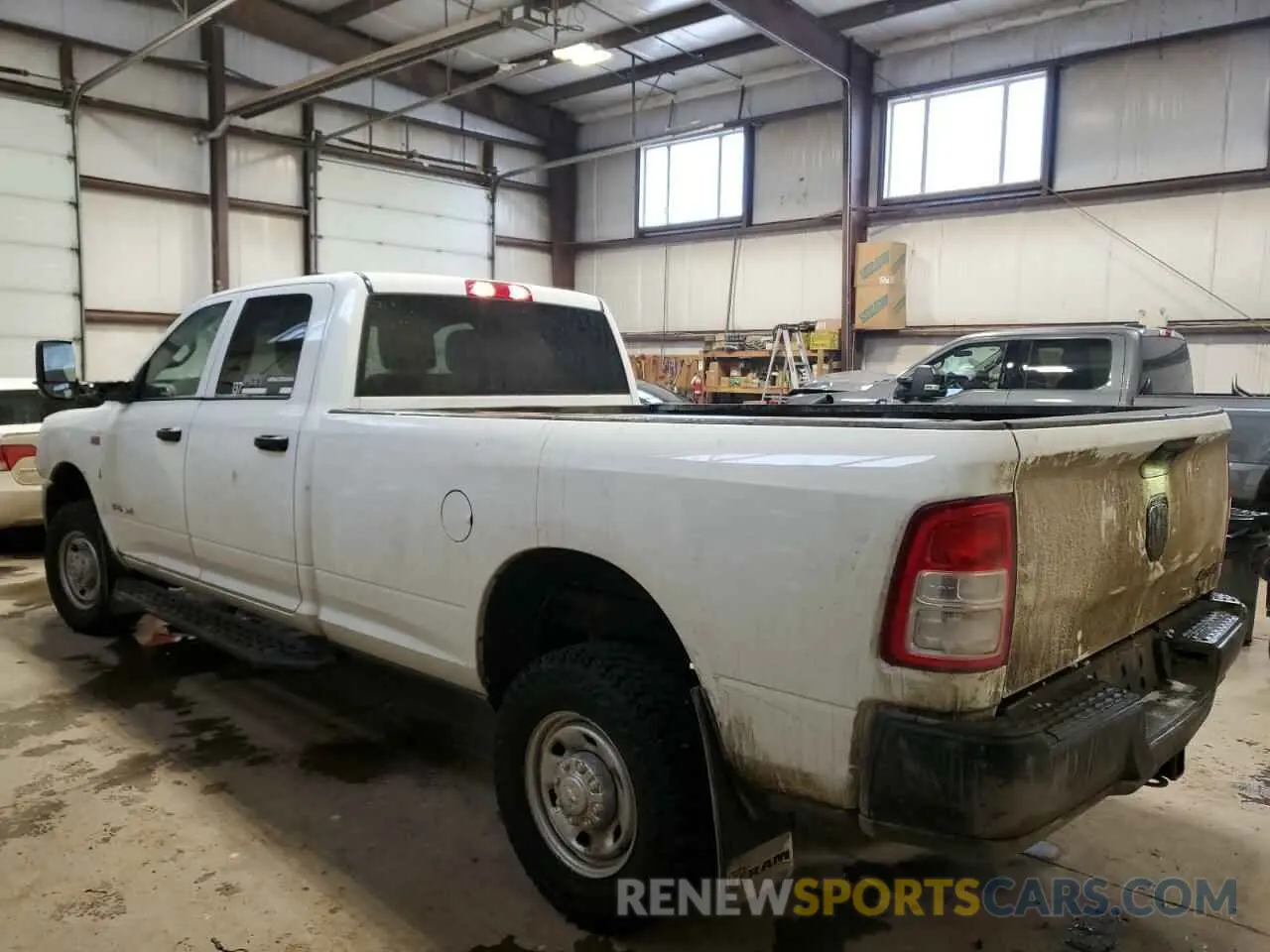 2 Photograph of a damaged car 3C6UR5HJ3NG365610 RAM 2500 2022