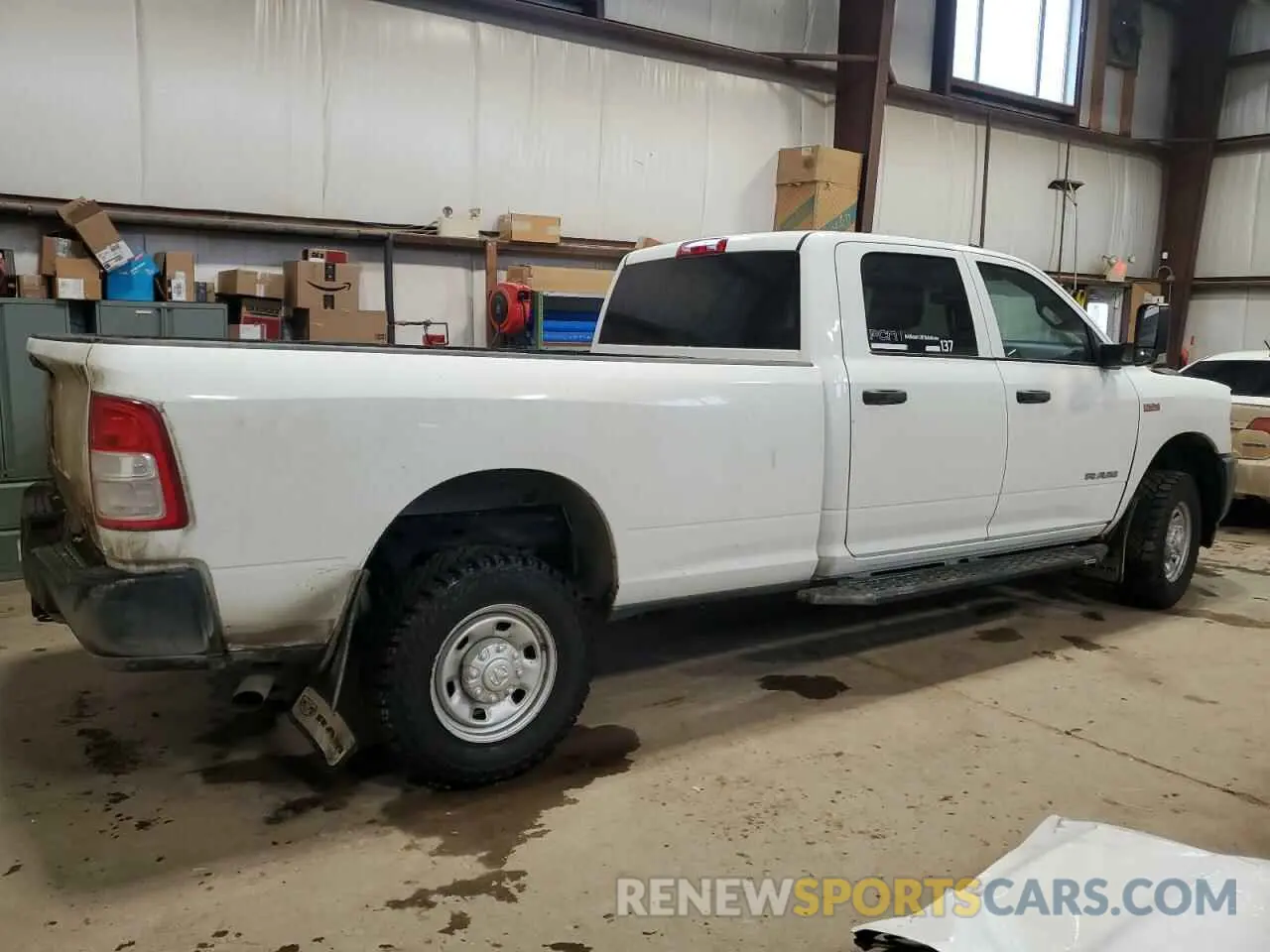 3 Photograph of a damaged car 3C6UR5HJ3NG365610 RAM 2500 2022